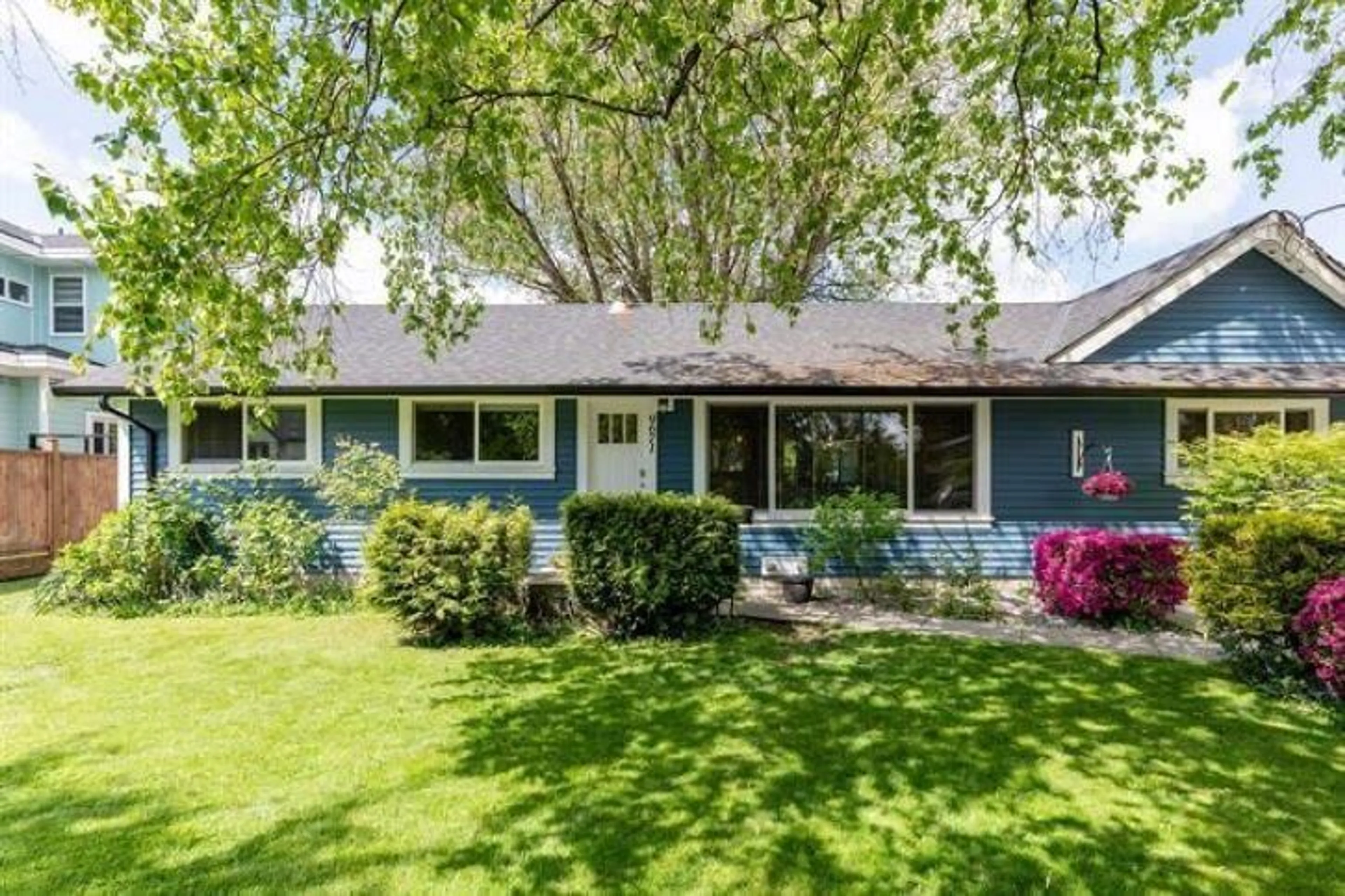 Home with vinyl exterior material, street for 9671 153A, Surrey British Columbia V3R4J1