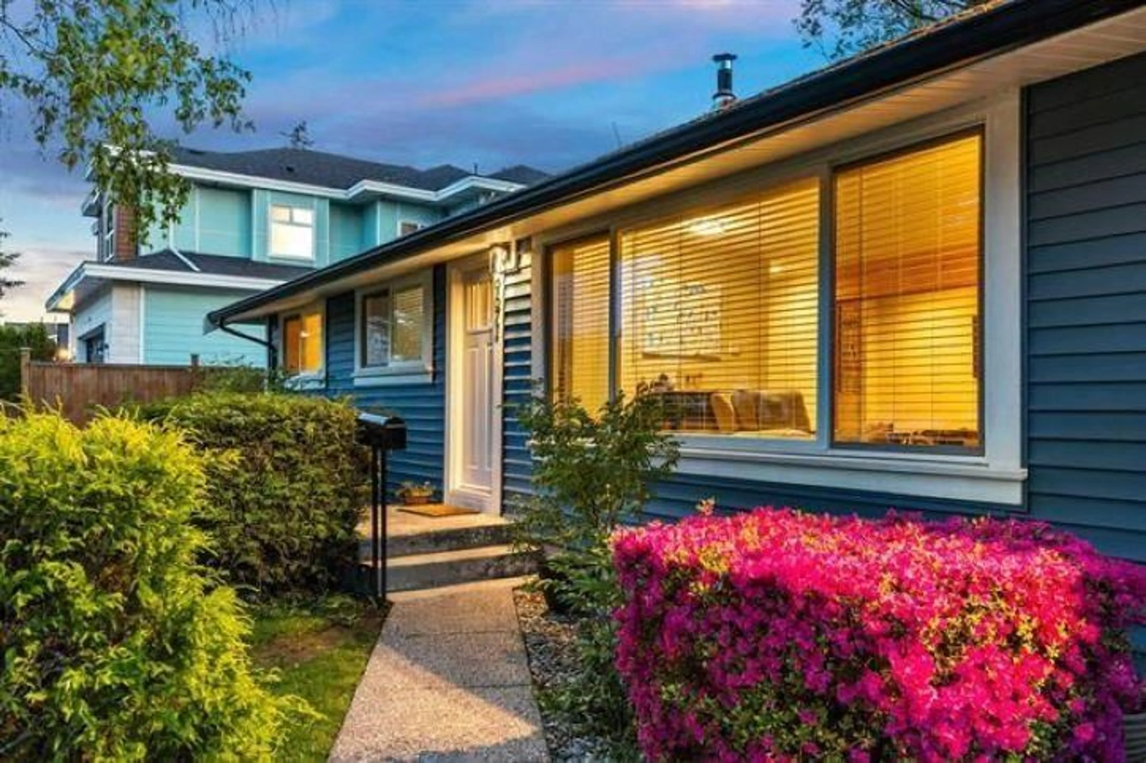 Home with vinyl exterior material, street for 9671 153A, Surrey British Columbia V3R4J1