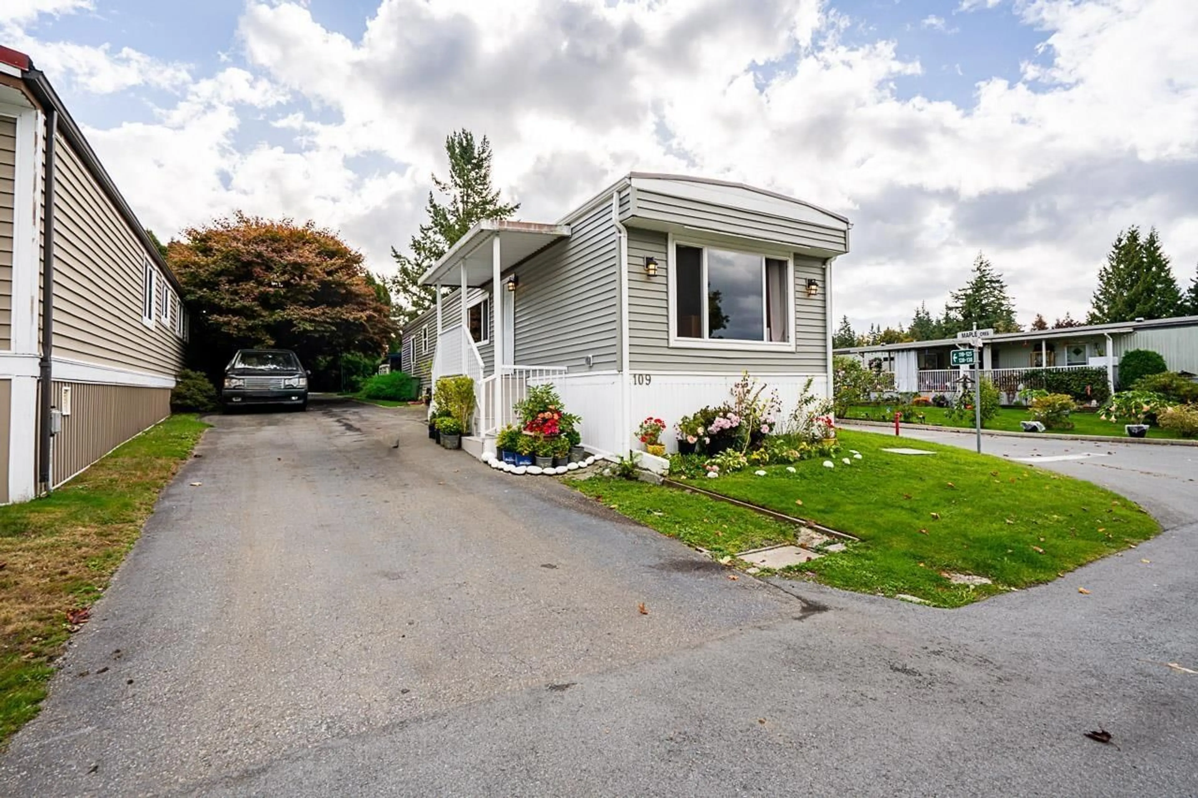 Home with vinyl exterior material, street for 109 - 3665 244, Langley British Columbia V2Z1N1