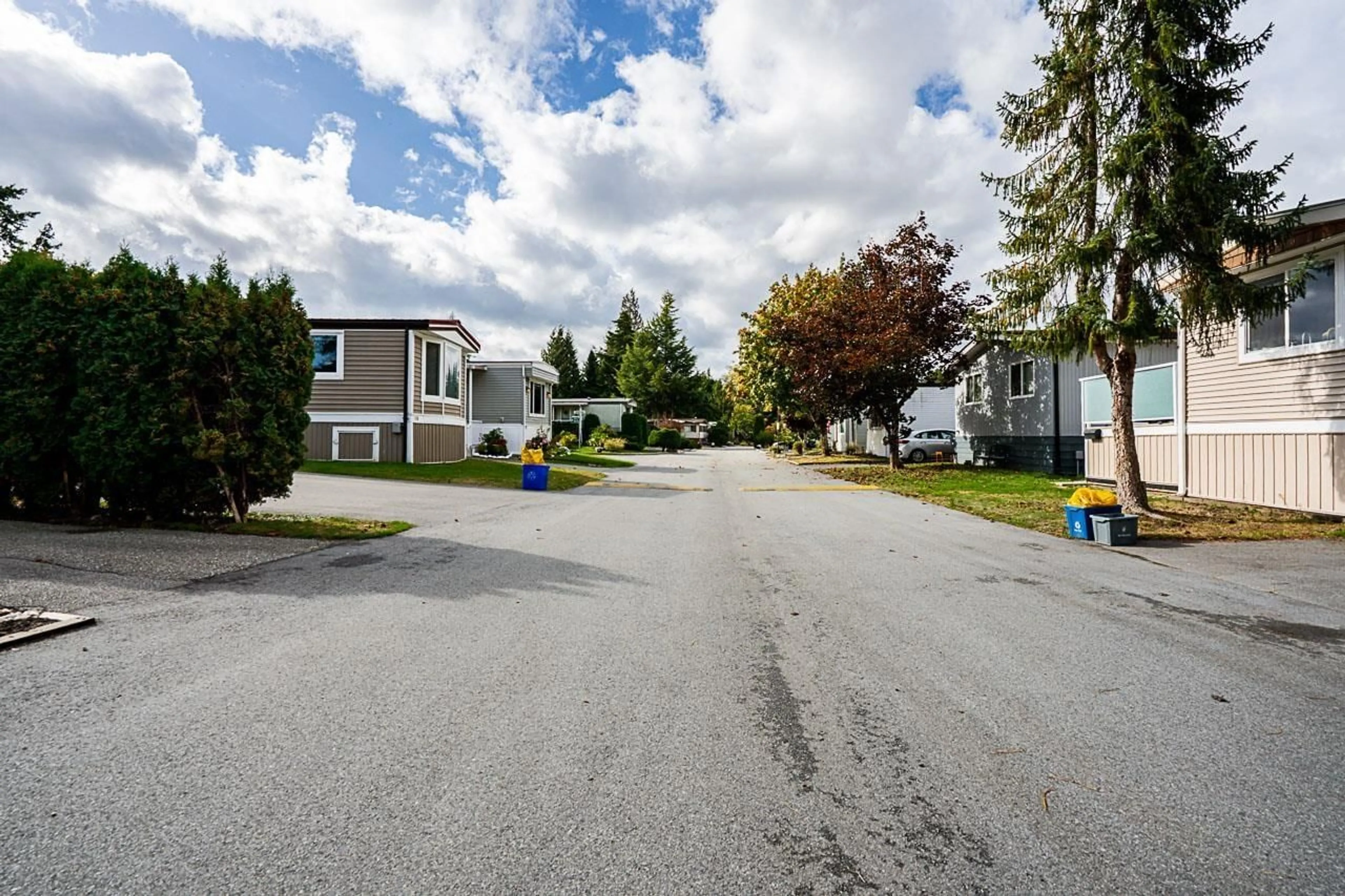 A pic from outside/outdoor area/front of a property/back of a property/a pic from drone, street for 109 - 3665 244, Langley British Columbia V2Z1N1