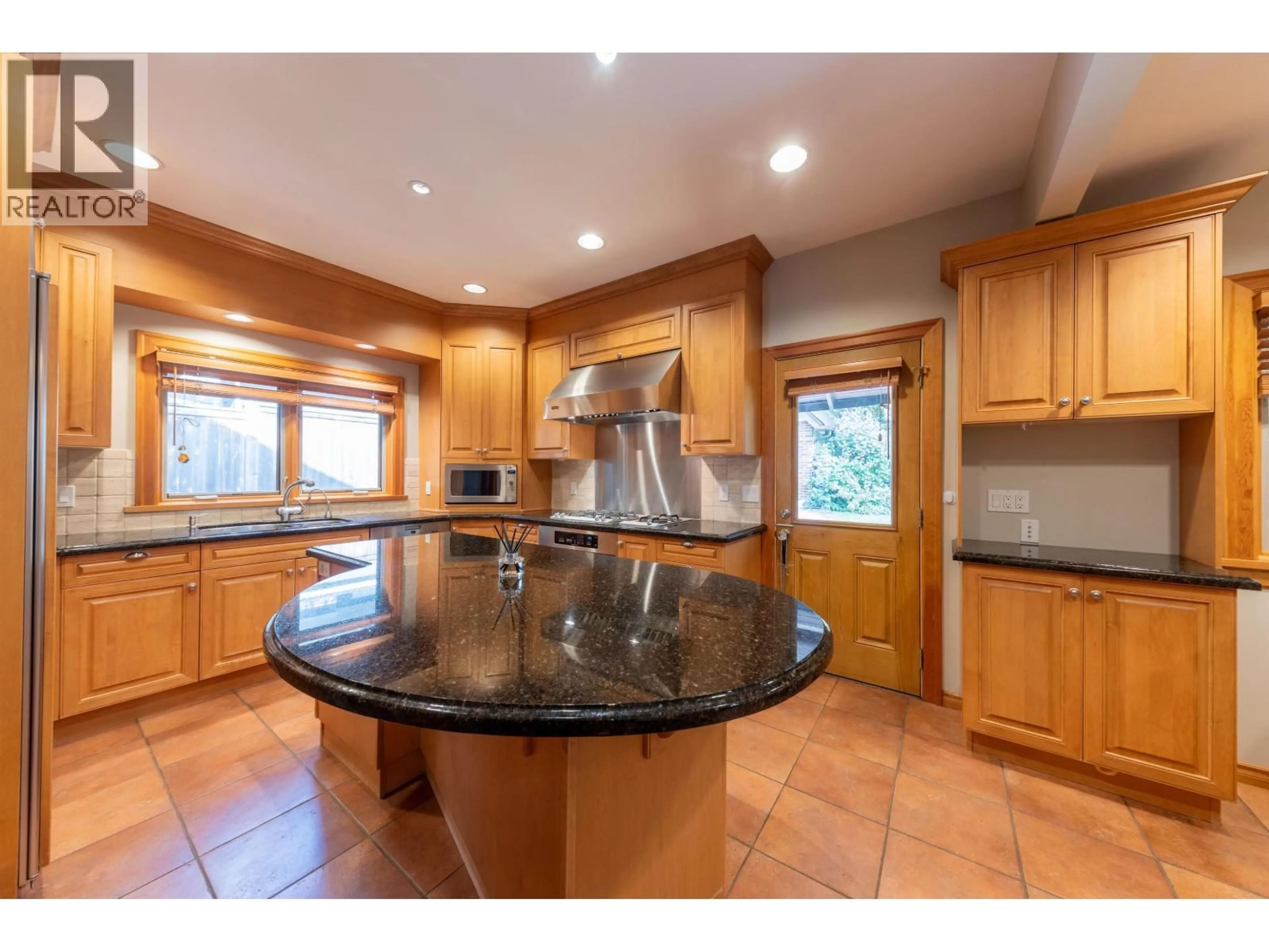 Open concept kitchen, ceramic/tile floor for 6026 ANGUS DRIVE, Vancouver British Columbia V6M3P1