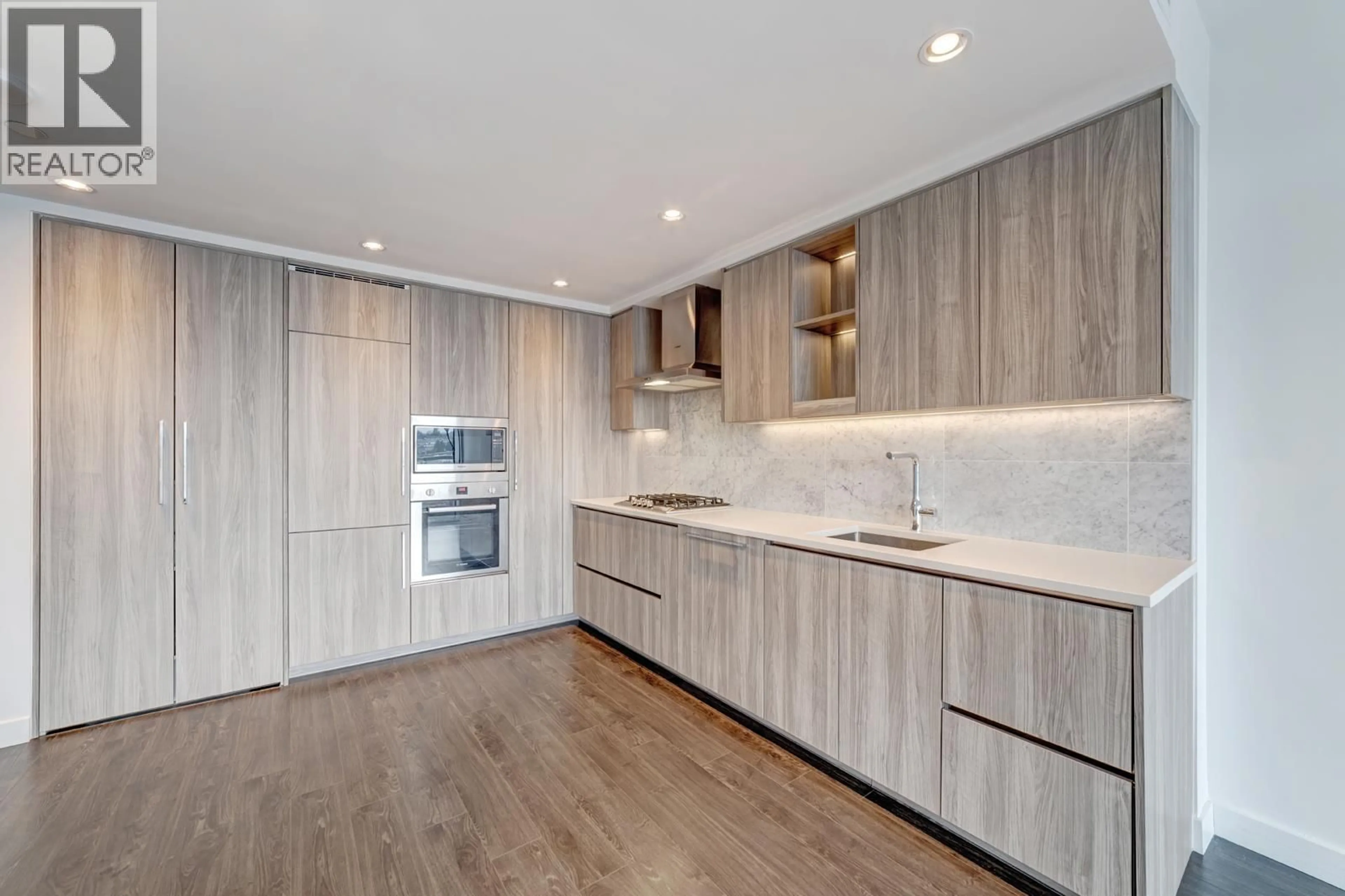 Contemporary kitchen, wood/laminate floor for 410 - 4720 LOUGHEED HIGHWAY, Burnaby British Columbia V5C0M8
