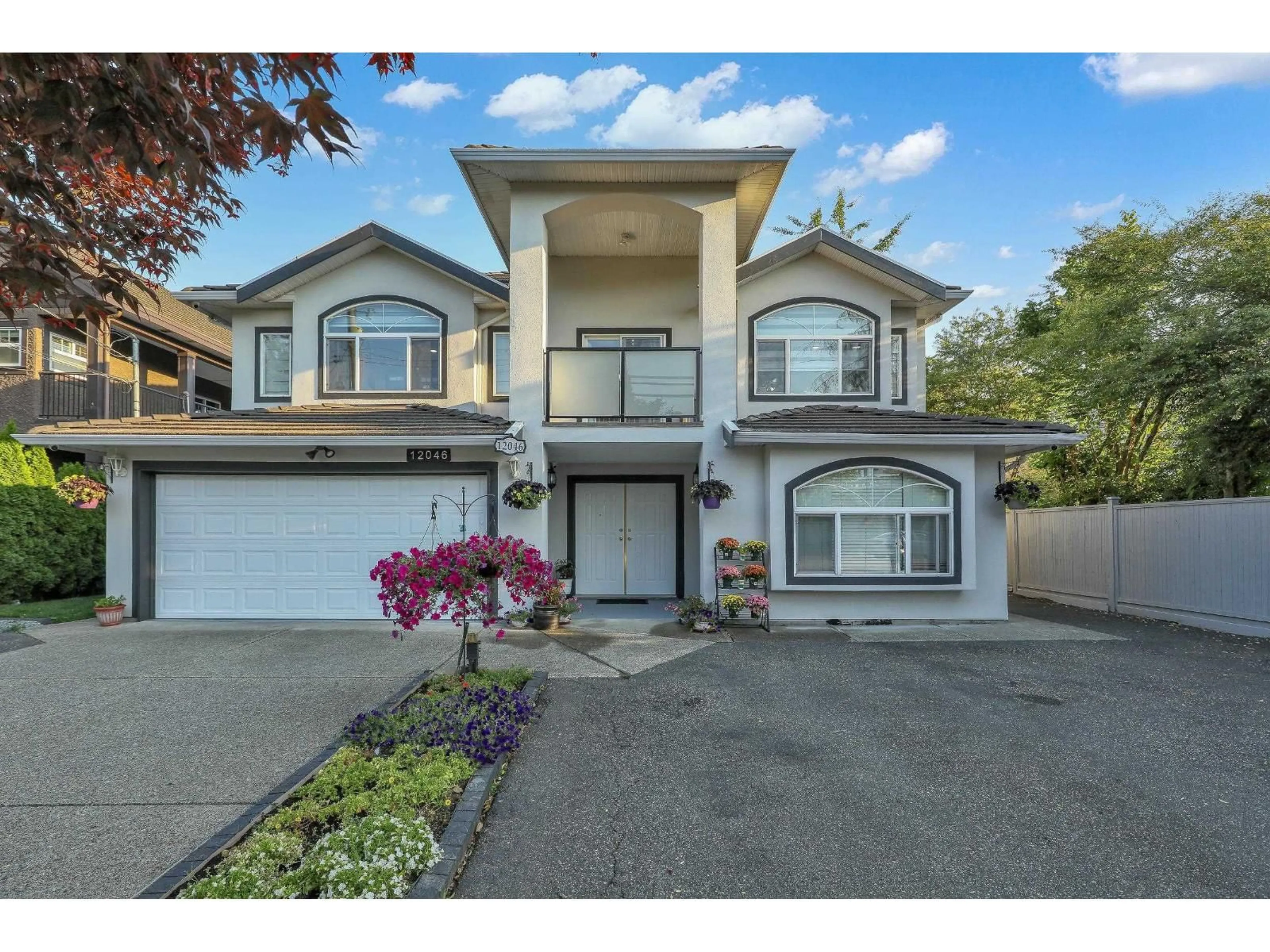 Home with vinyl exterior material, street for 12046 84, Surrey British Columbia V3W3G3