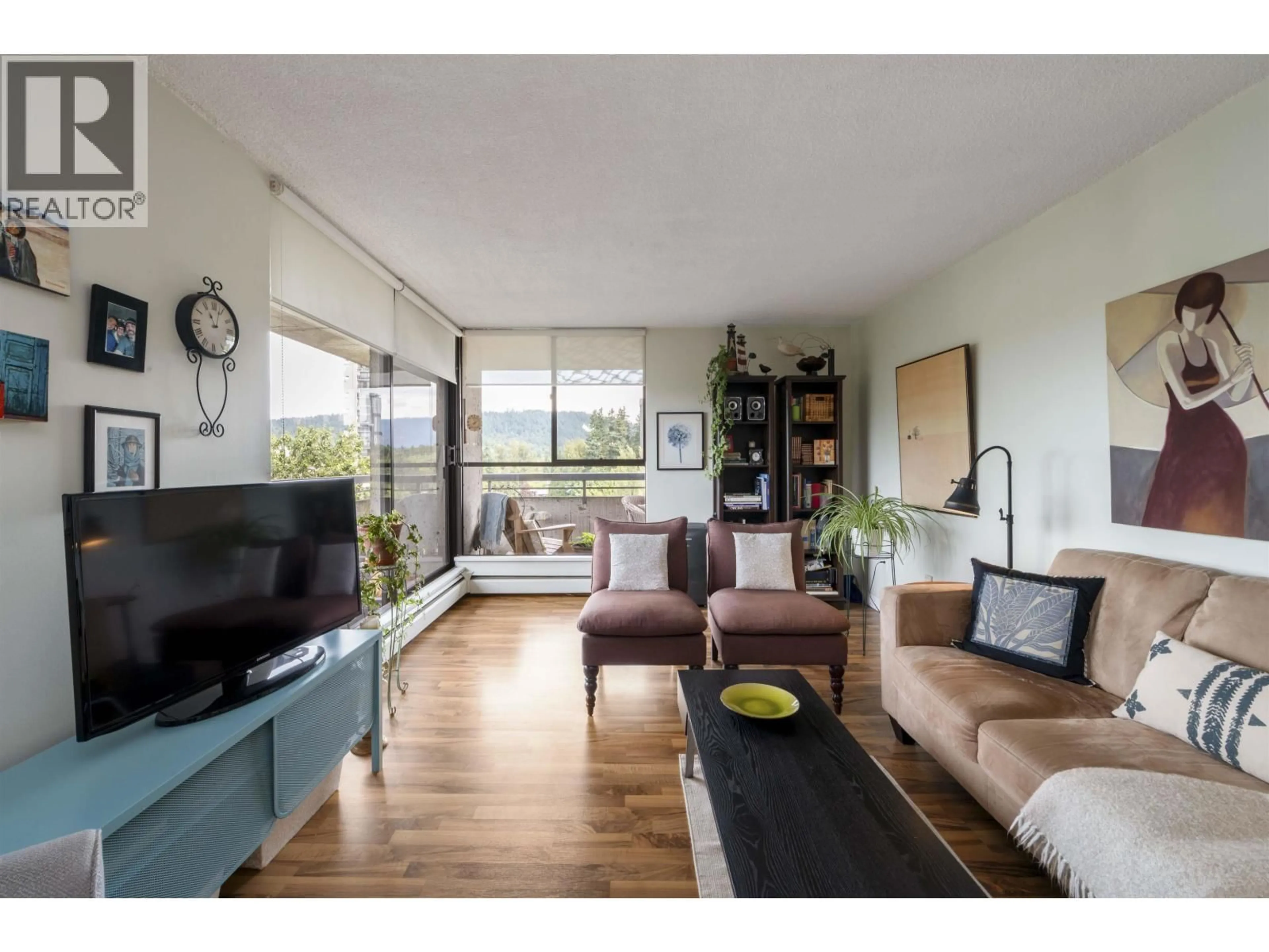 Living room with furniture, wood/laminate floor for 1105 - 3737 BARTLETT COURT, Burnaby British Columbia V3J7E3