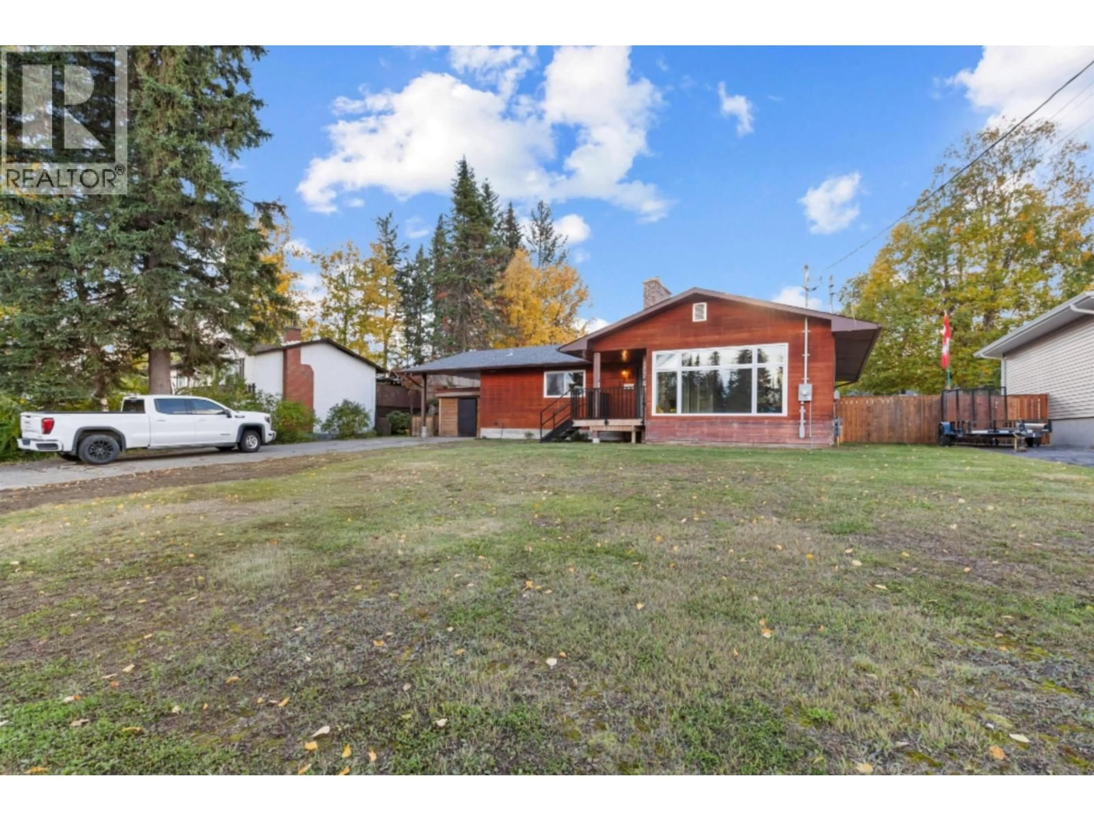 A pic from outside/outdoor area/front of a property/back of a property/a pic from drone, street for 3019 KILLARNEY DRIVE, Prince George British Columbia V2K2A8