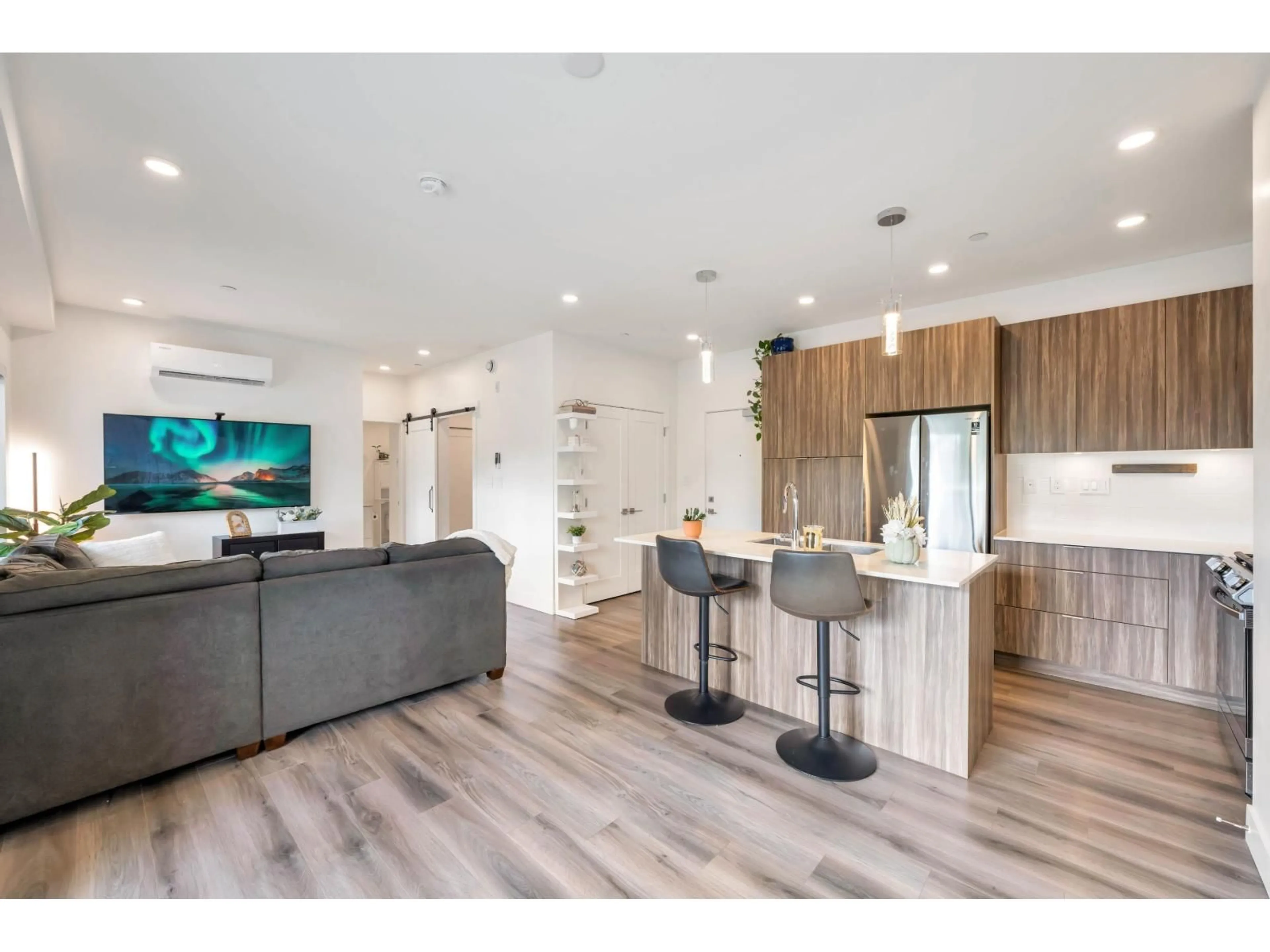 Open concept kitchen, wood/laminate floor for A507 - 8447 202, Langley British Columbia V2Y4K1