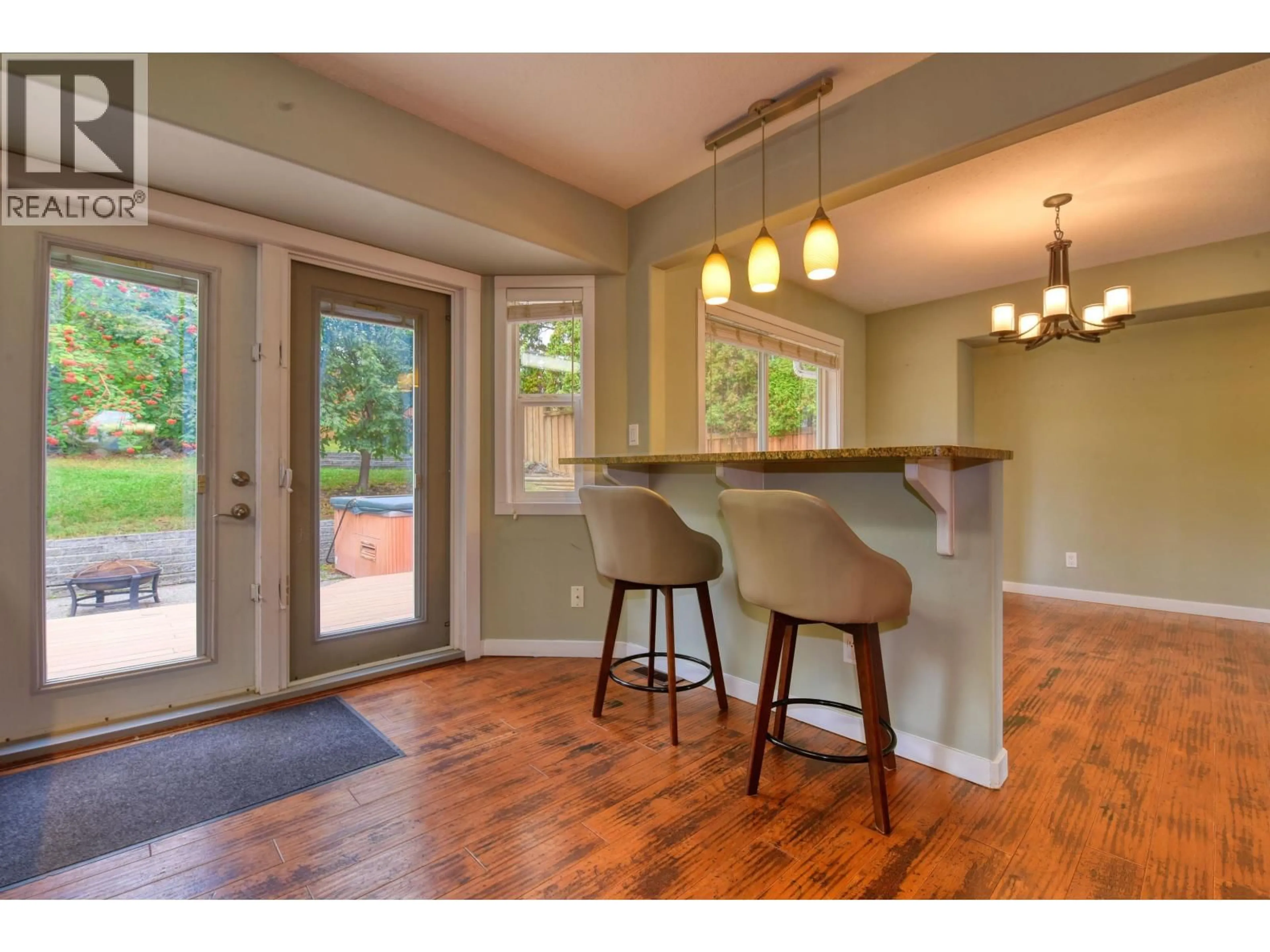 Open concept kitchen, wood/laminate floor for 123 WESTRIDGE DRIVE, Williams Lake British Columbia V2G5K4
