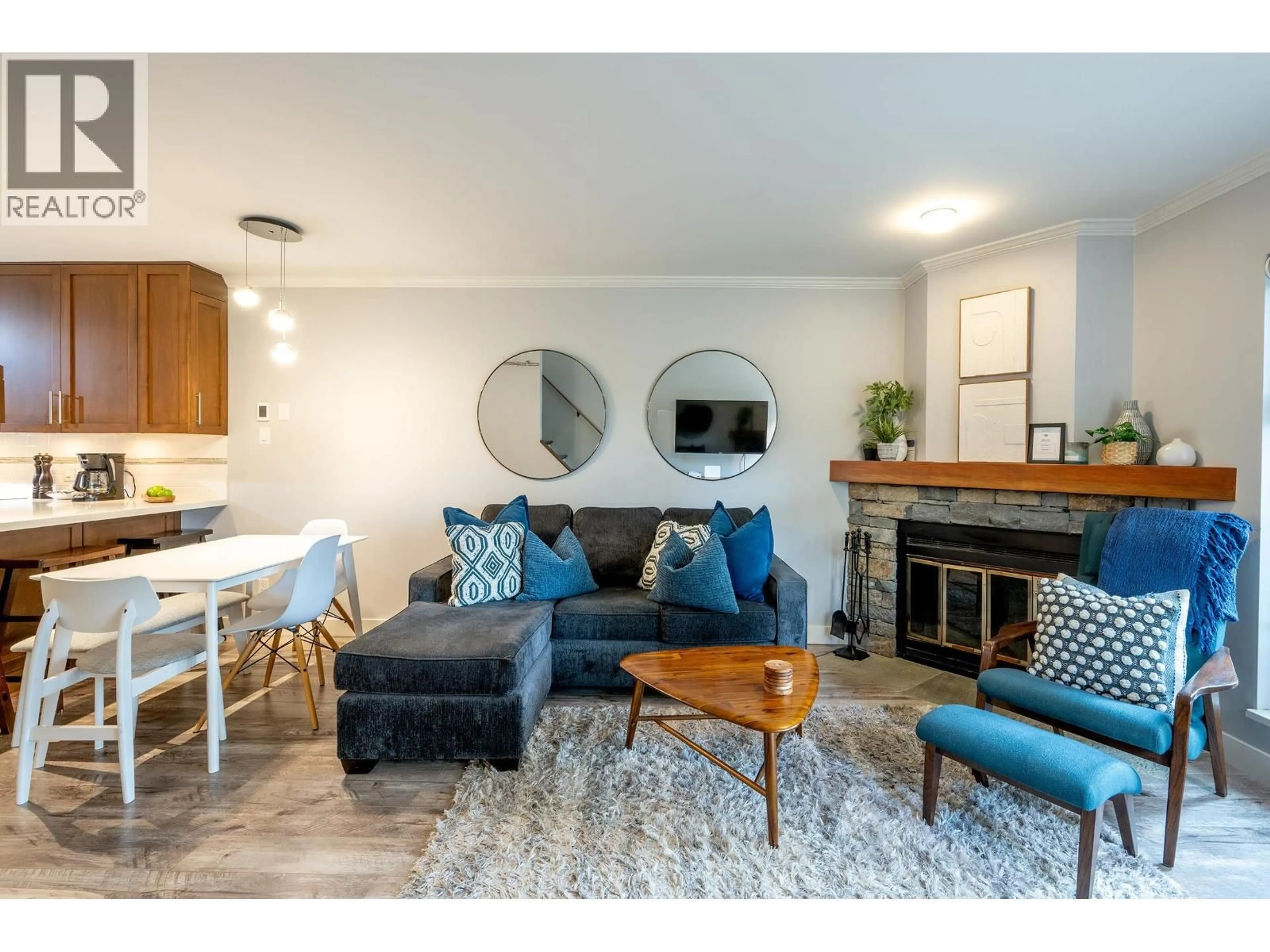 Living room with furniture, wood/laminate floor for 10 - 2211 MARMOT PLACE, Whistler British Columbia V8E0M6