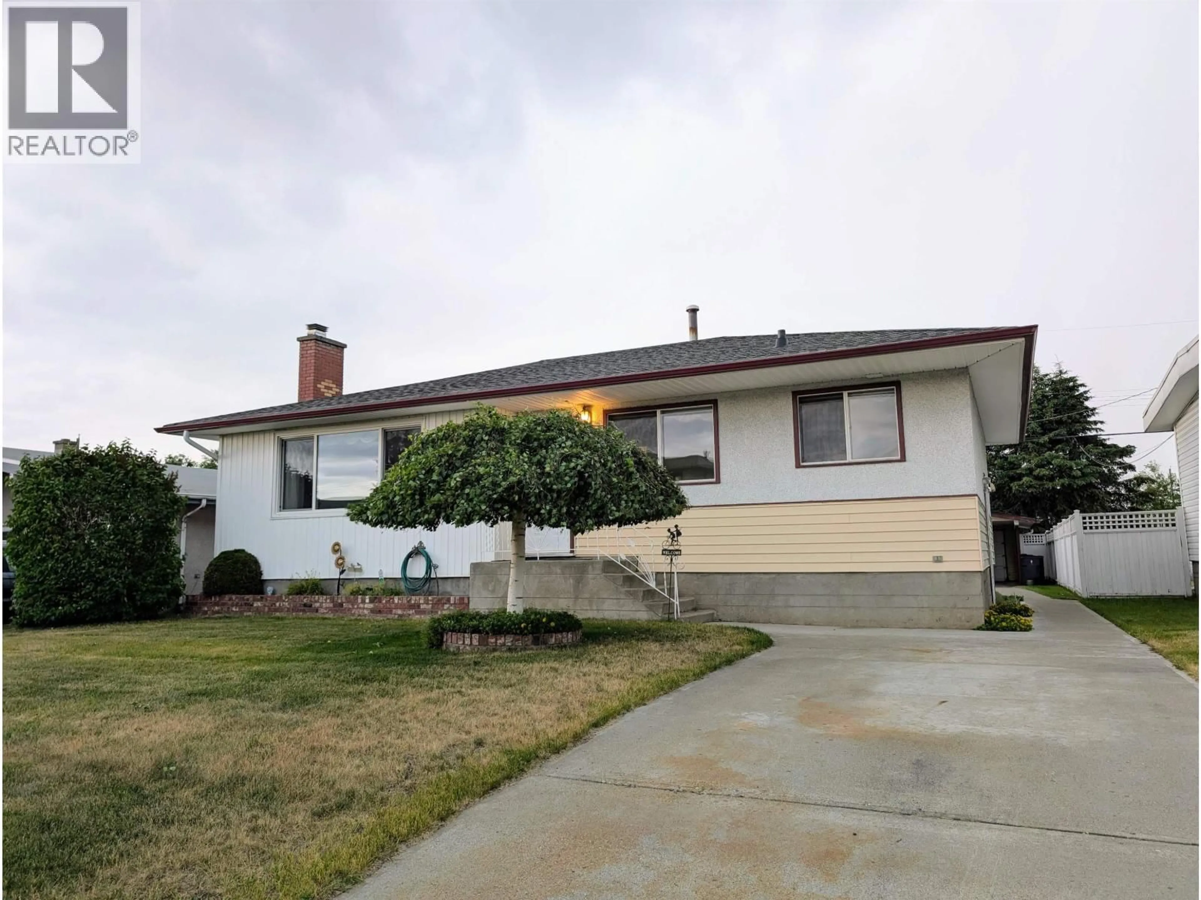 Home with vinyl exterior material, street for 374 NICHOLSON STREET, Prince George British Columbia V2M3L9