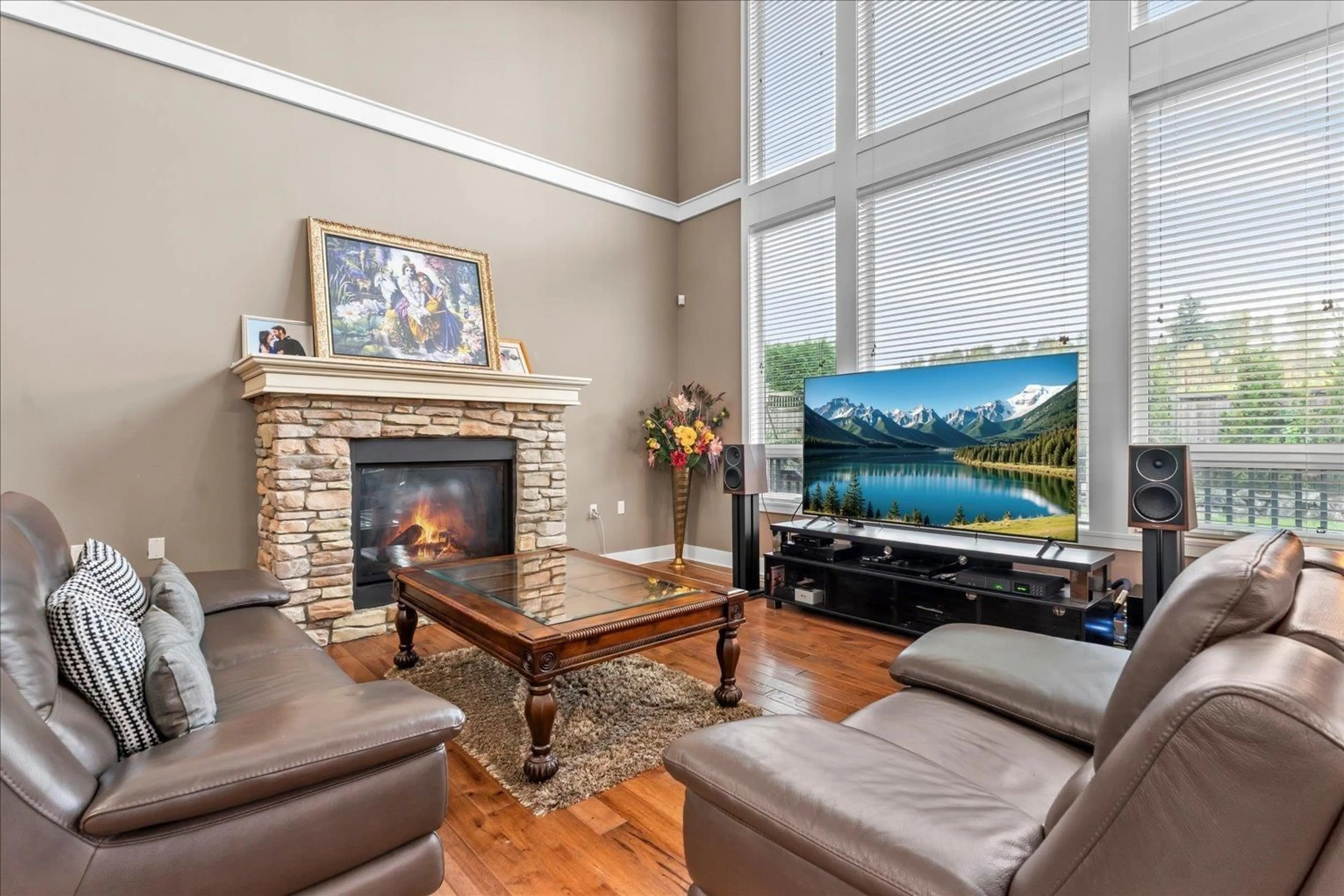 Living room with furniture, wood/laminate floor for 2203 RIESLING, Abbotsford British Columbia V4X0A6