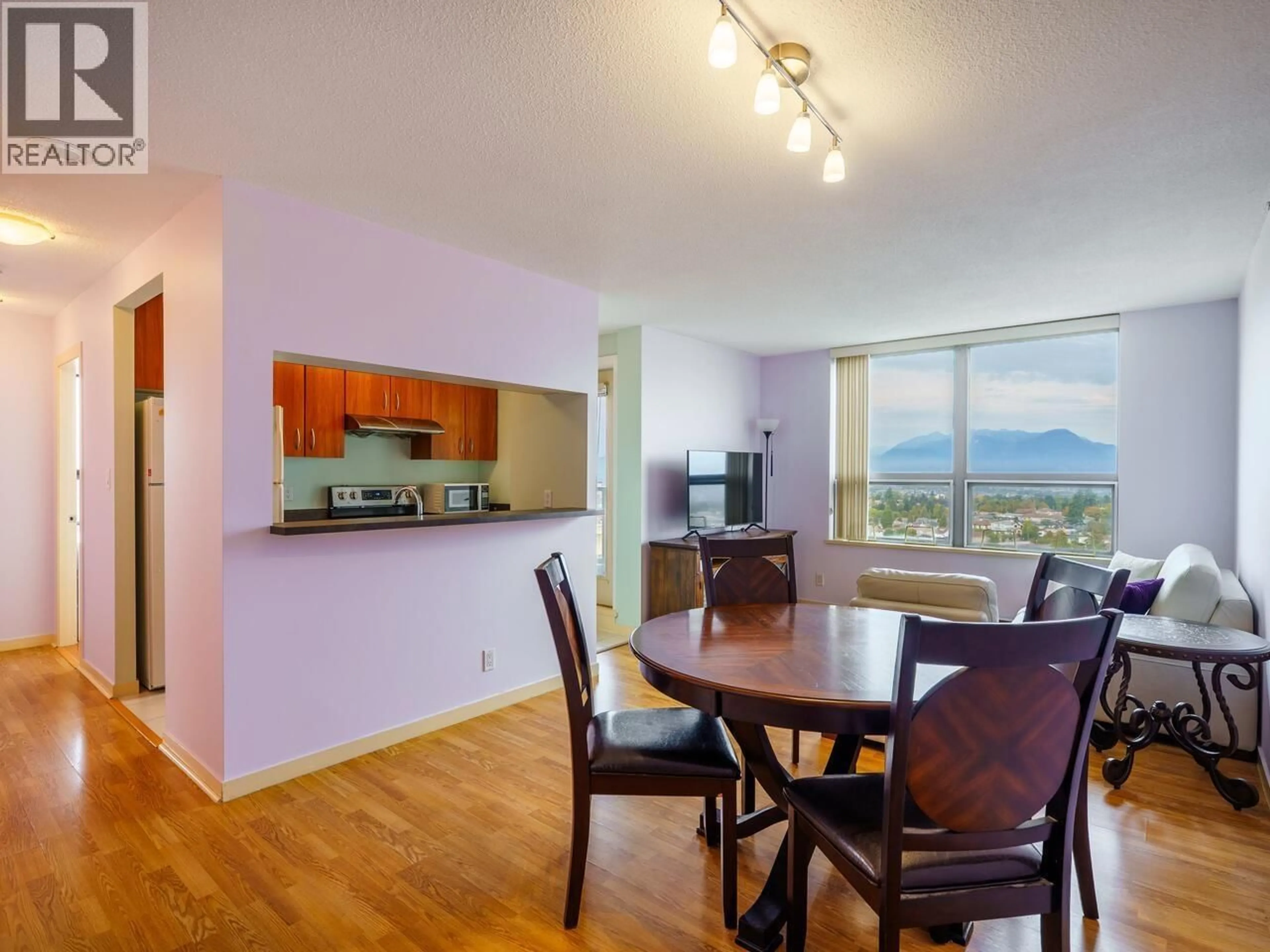Dining room, wood/laminate floor for 2409 - 3663 CROWLEY DRIVE, Vancouver British Columbia V5R6H4