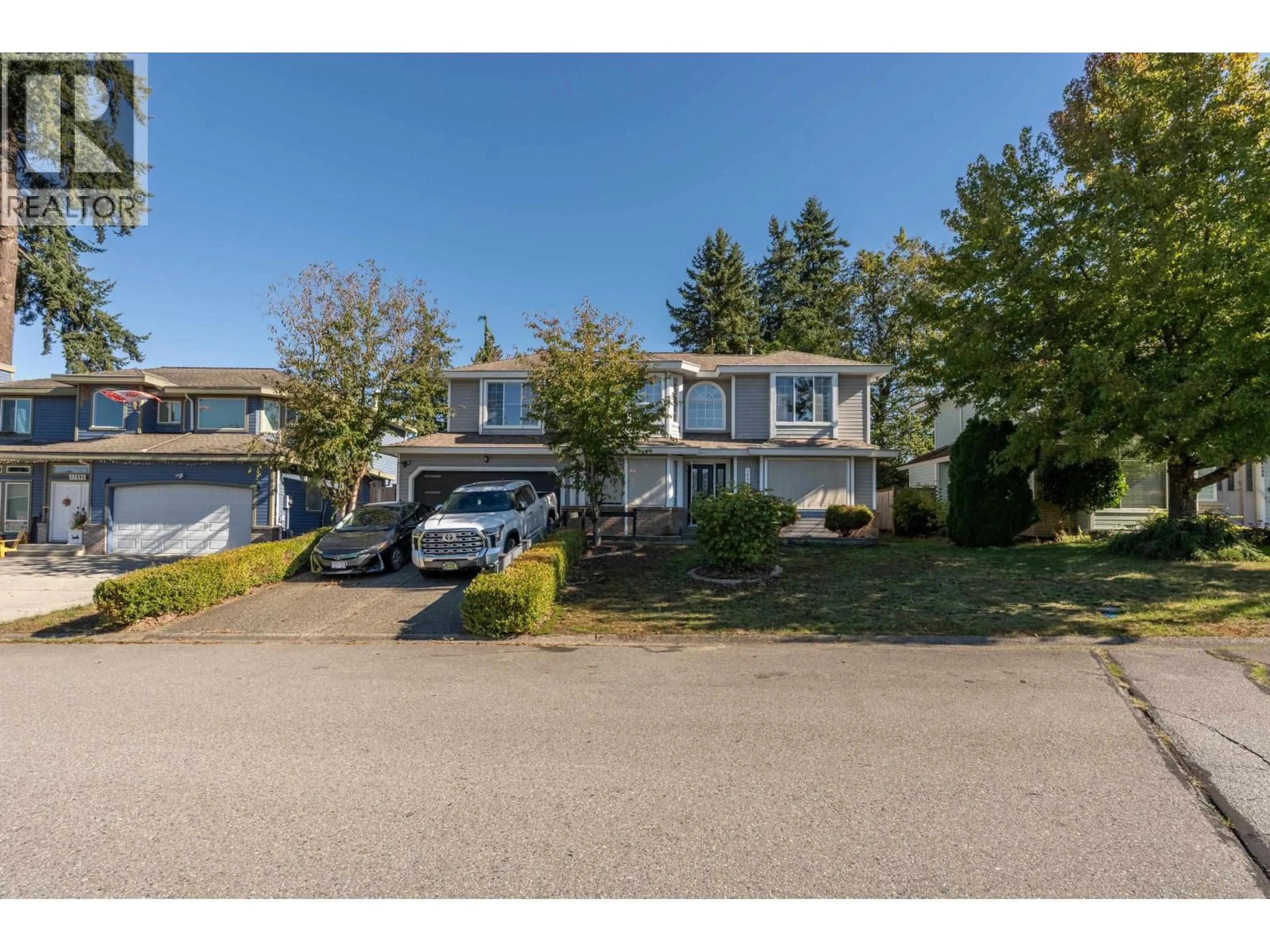 A pic from outside/outdoor area/front of a property/back of a property/a pic from drone, street for 12492 205 STREET, Maple Ridge British Columbia V3X0A9