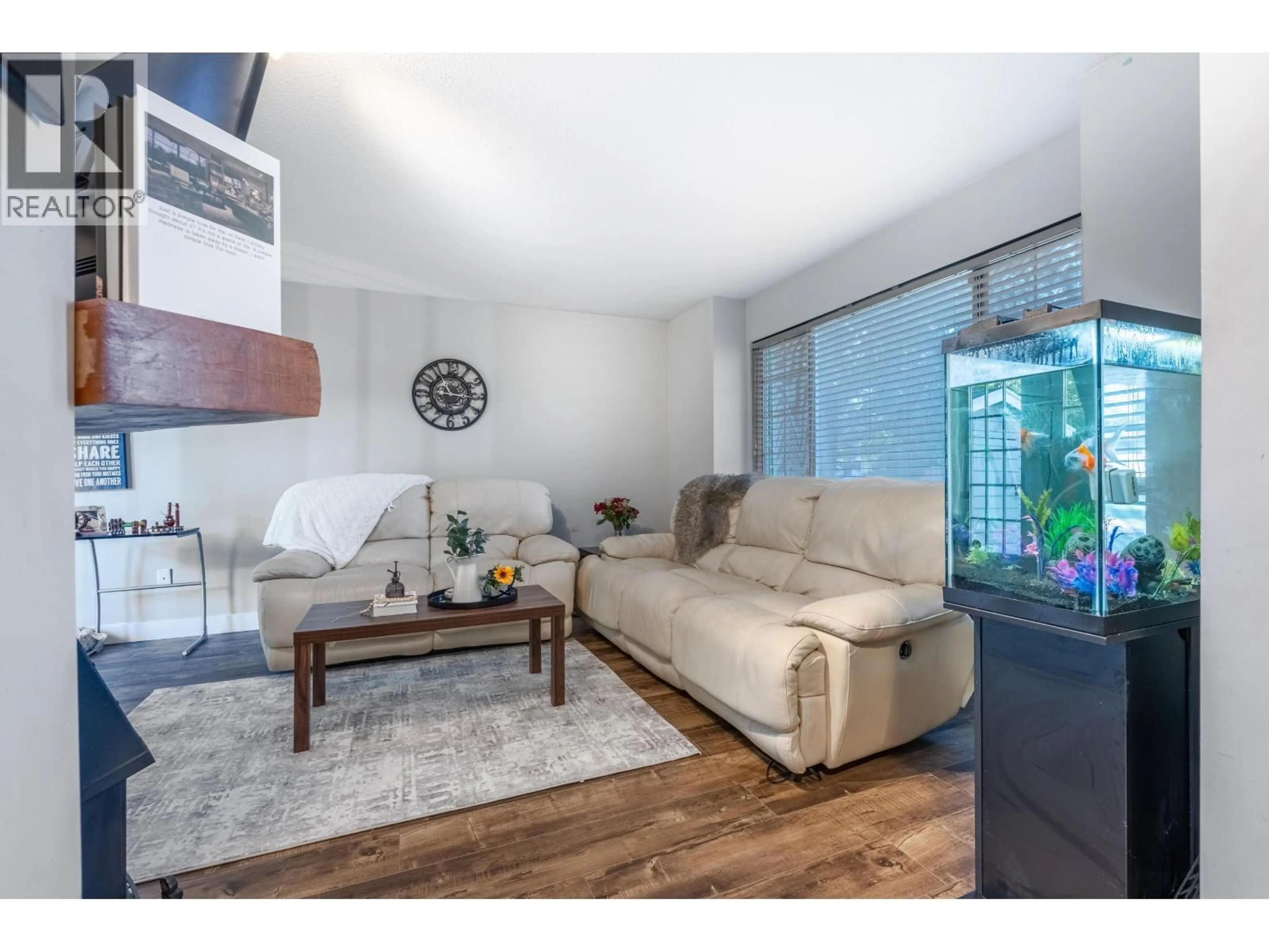 Living room with furniture, wood/laminate floor for 12492 205 STREET, Maple Ridge British Columbia V3X0A9