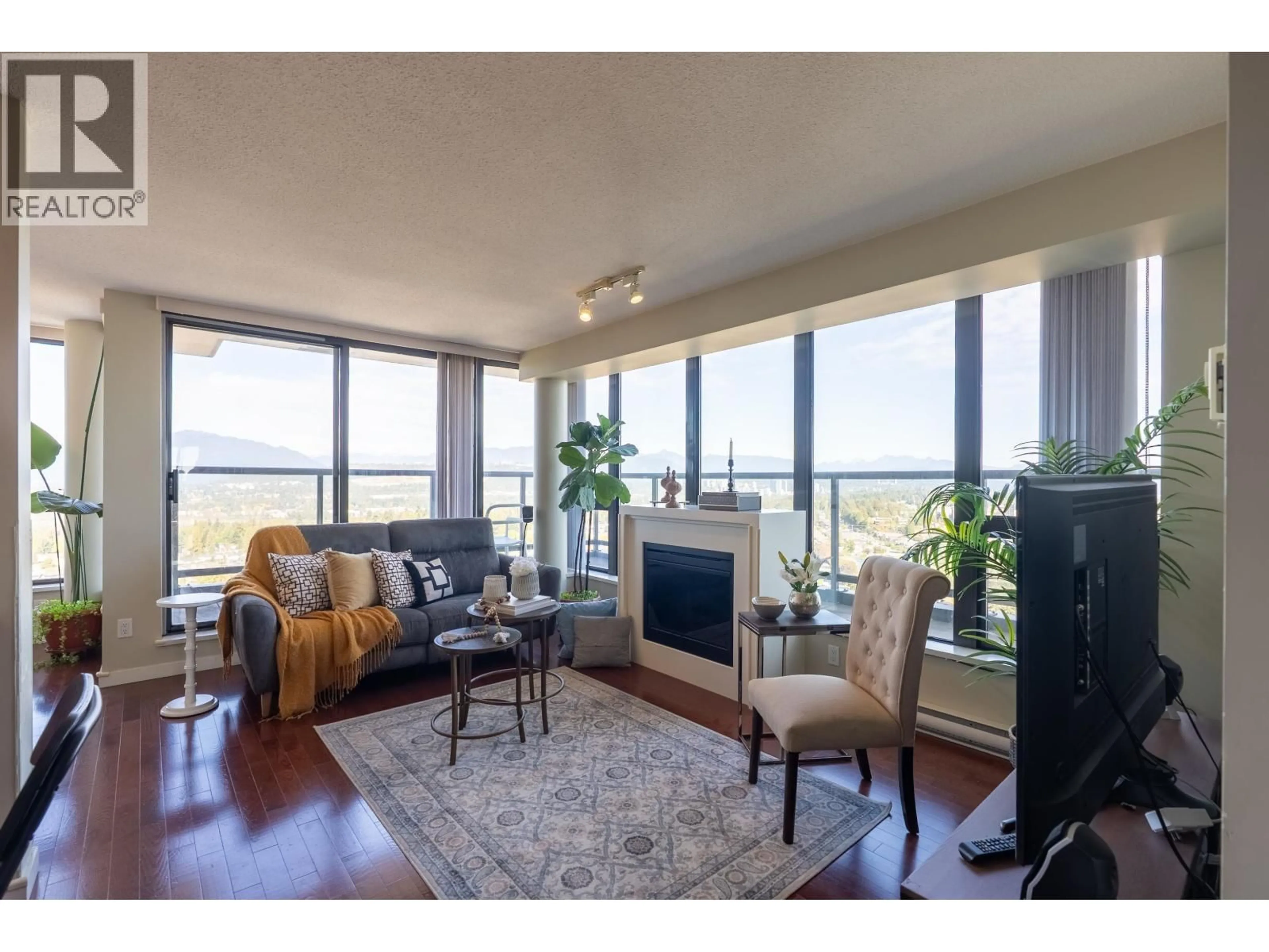 Living room with furniture, wood/laminate floor for 2803 - 7108 COLLIER STREET, Burnaby British Columbia V5E0A1