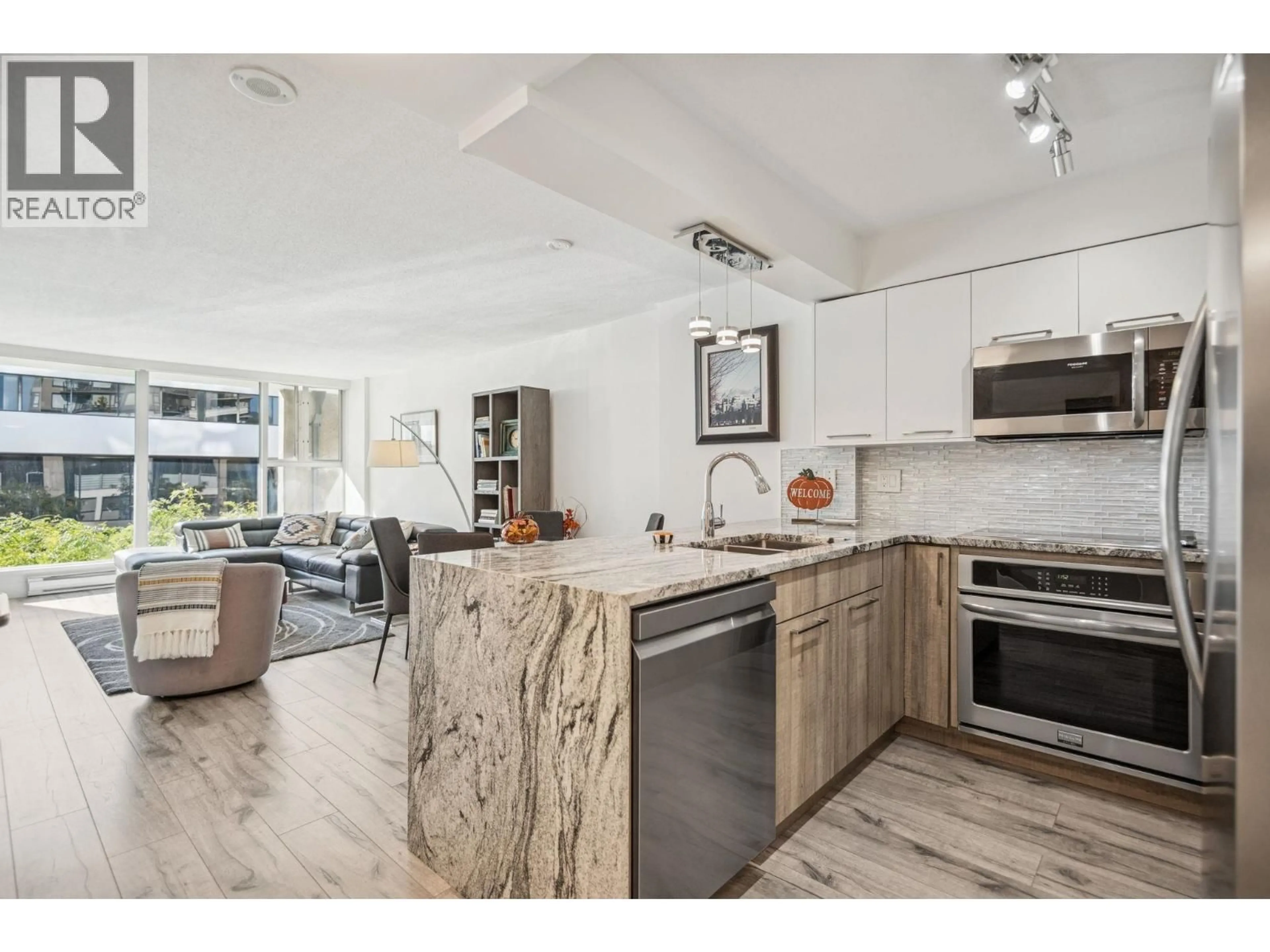 Open concept kitchen, unknown for 205 - 1633 8TH AVENUE, Vancouver British Columbia V6J5H7
