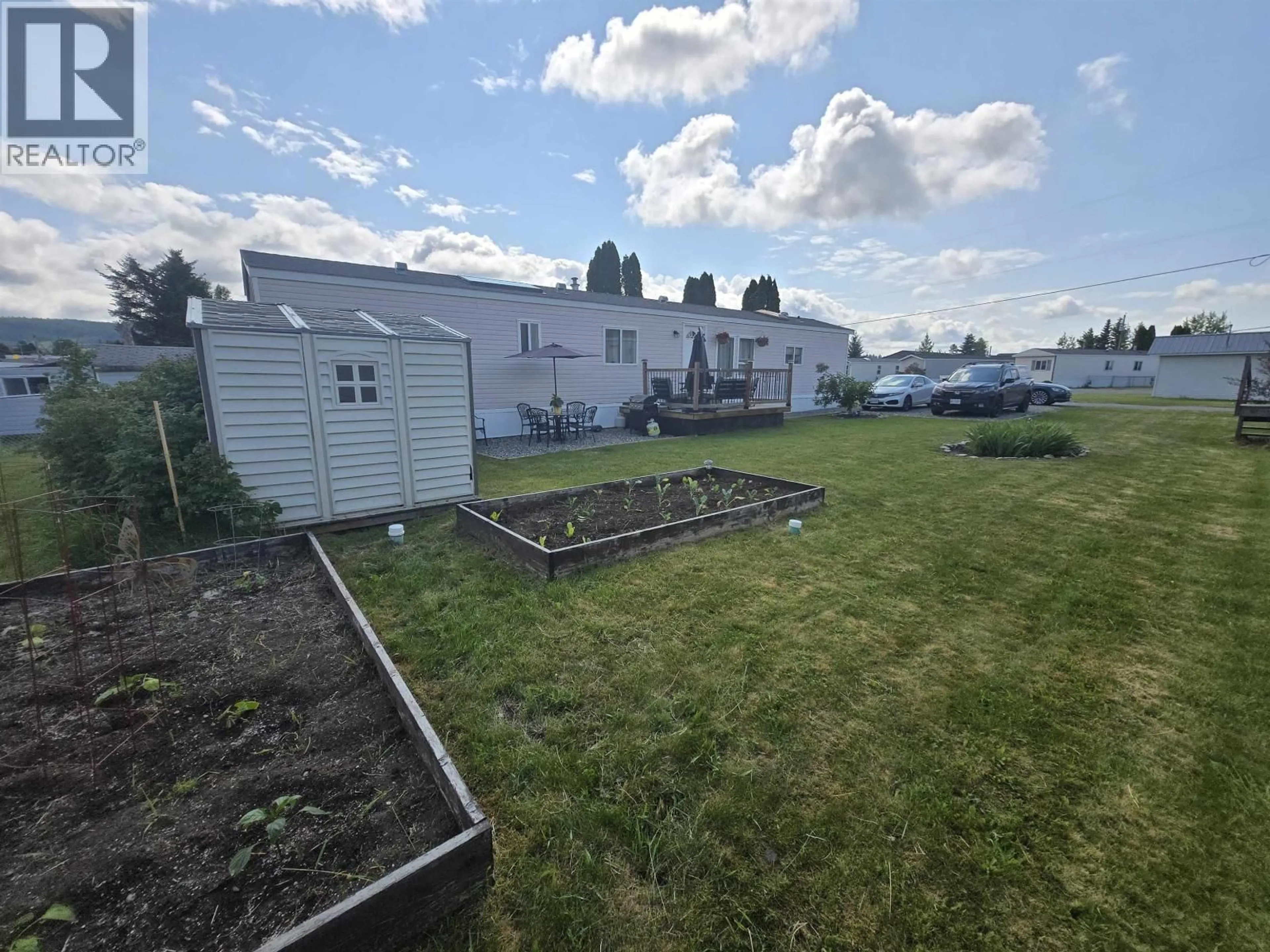 A pic from outside/outdoor area/front of a property/back of a property/a pic from drone, unknown for 6 - 602 ELM STREET, Quesnel British Columbia V2J3X1
