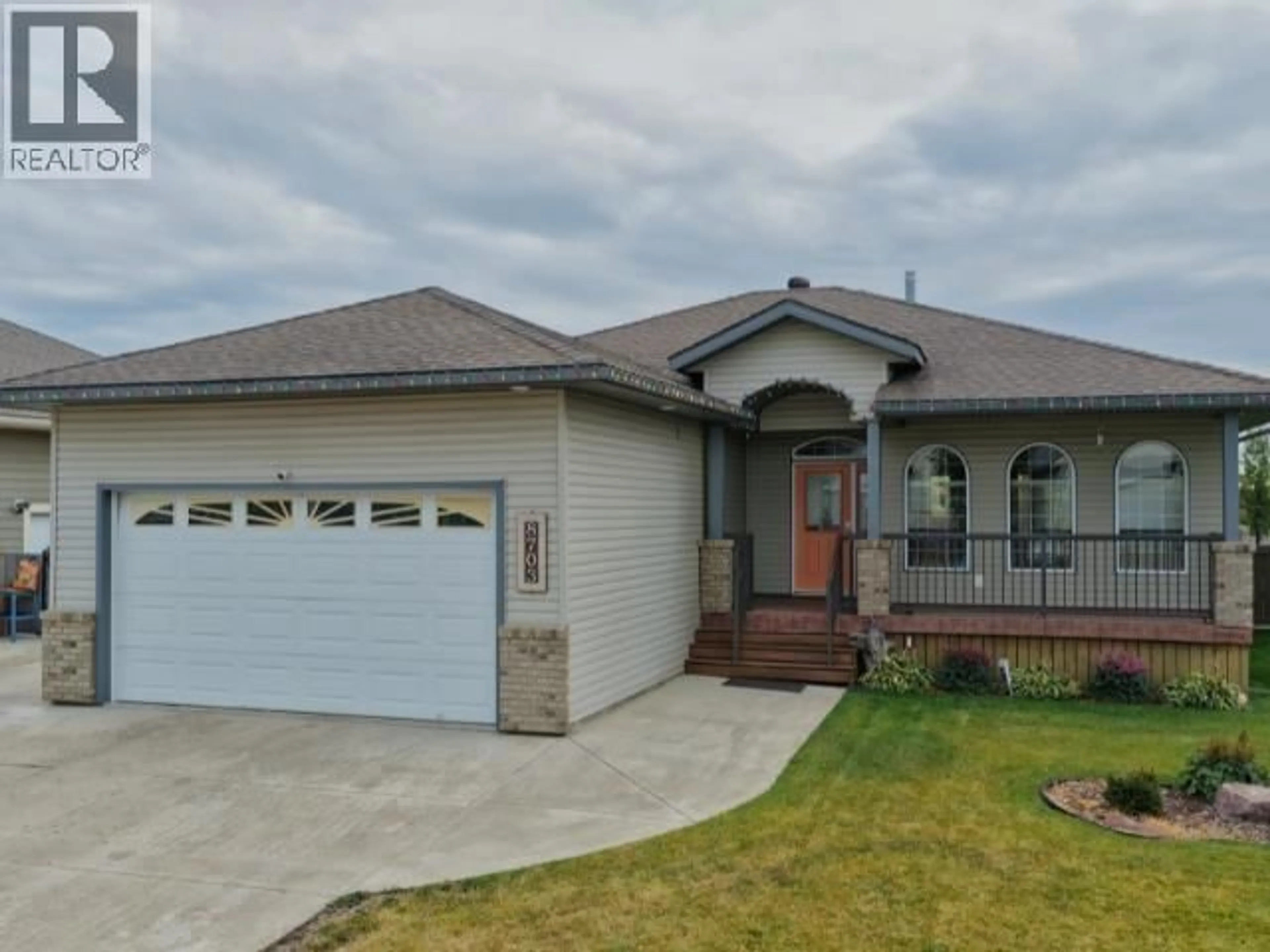 Home with vinyl exterior material, street for 8703 109 AVENUE, Fort St. John British Columbia V1J7E6