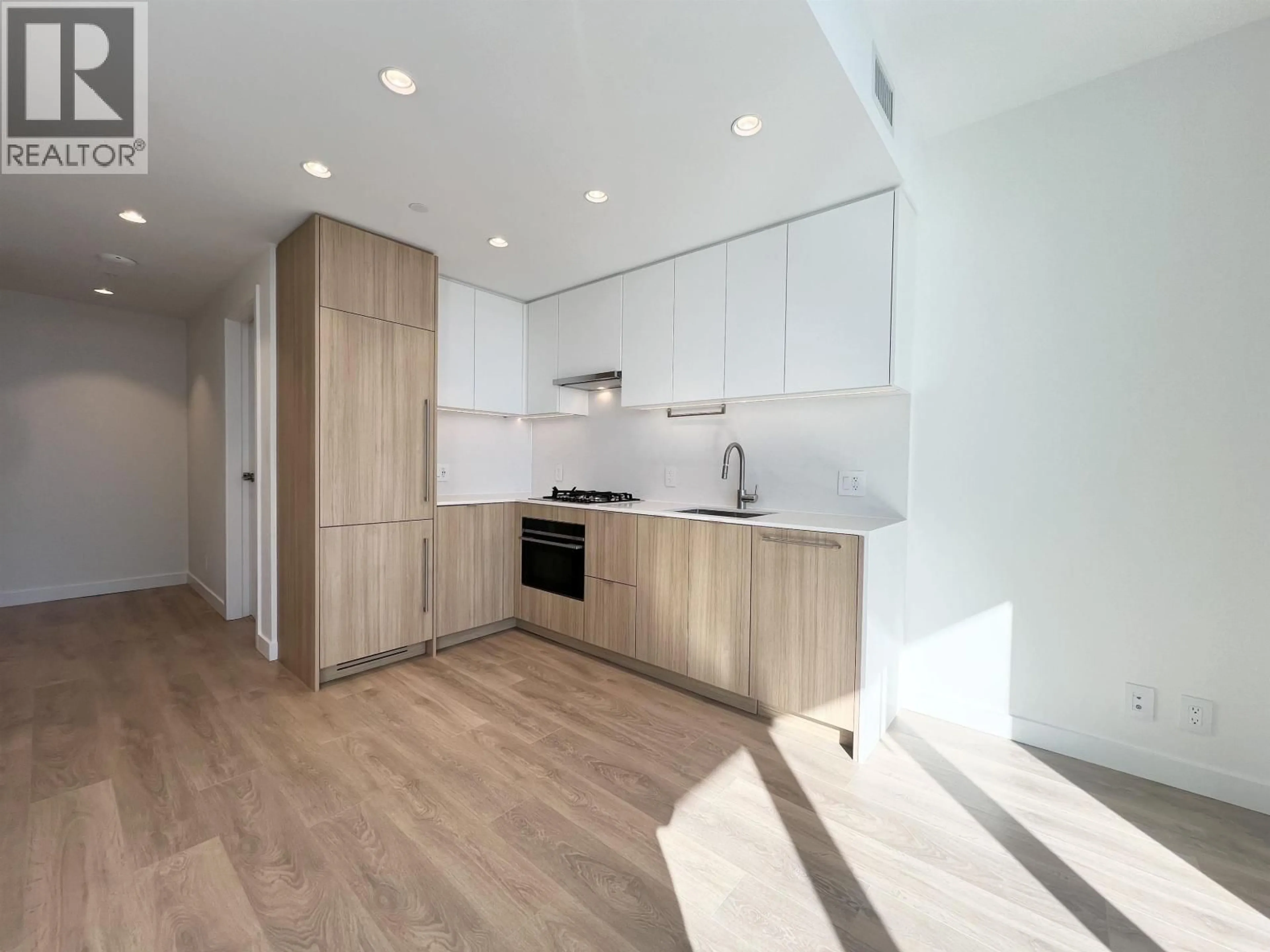 Open concept kitchen, wood/laminate floor for 901 - 505 NELSON STREET, Coquitlam British Columbia V3J0R5