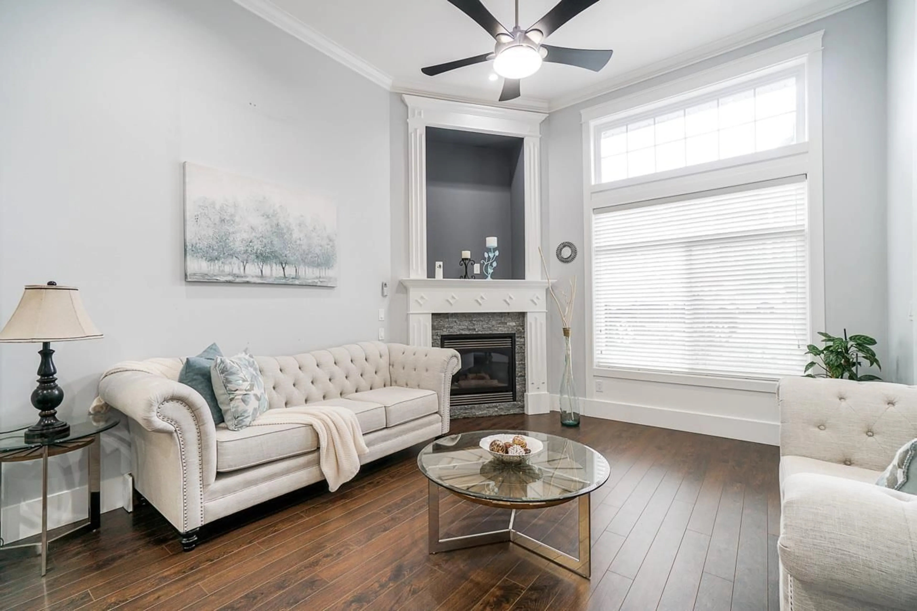 Living room with furniture, wood/laminate floor for 17742 102, Surrey British Columbia V4N5V8