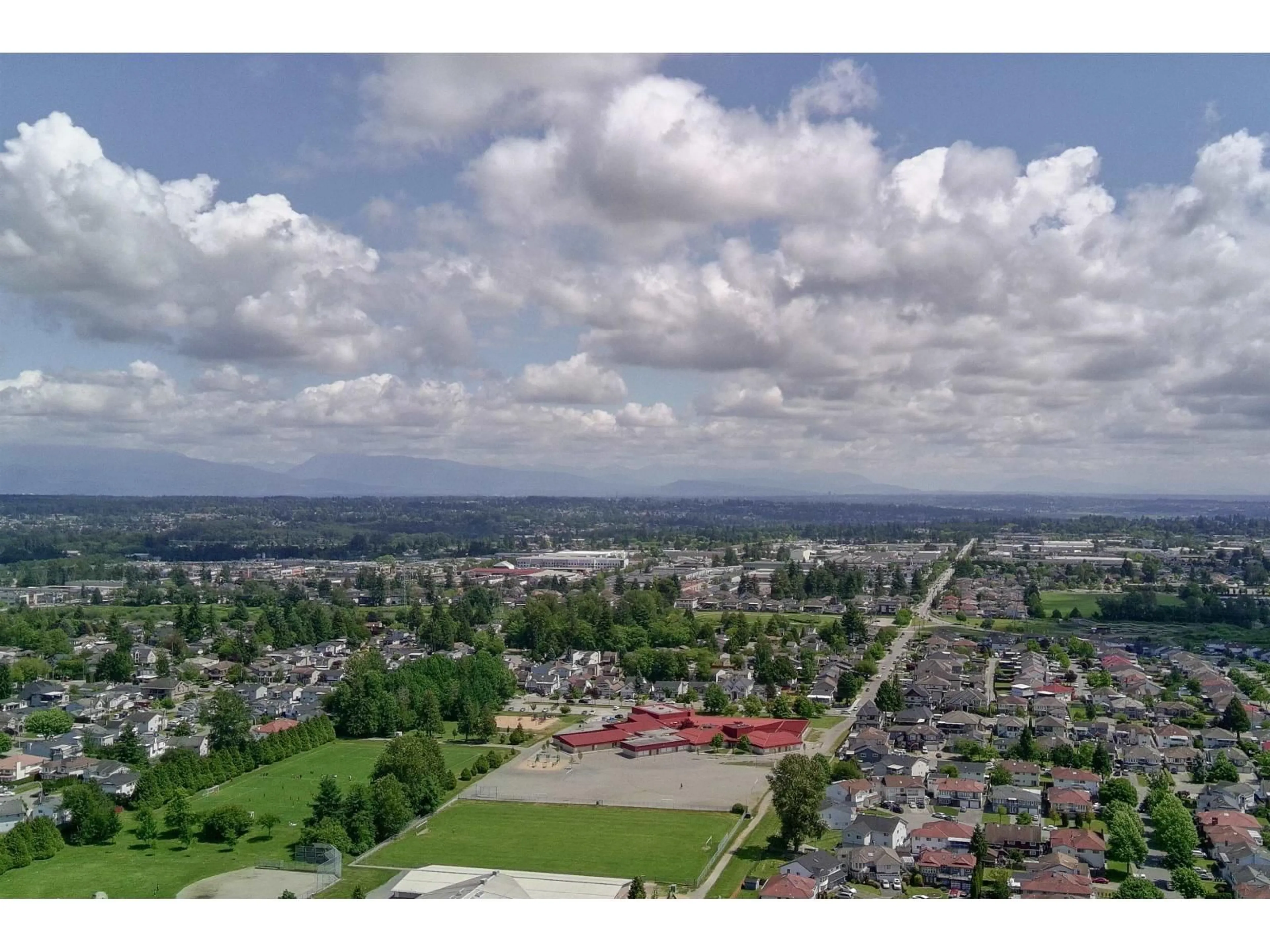 A pic from outside/outdoor area/front of a property/back of a property/a pic from drone, mountain view for 313 - 12125 75 A AVENUE, Surrey British Columbia V3W1B9
