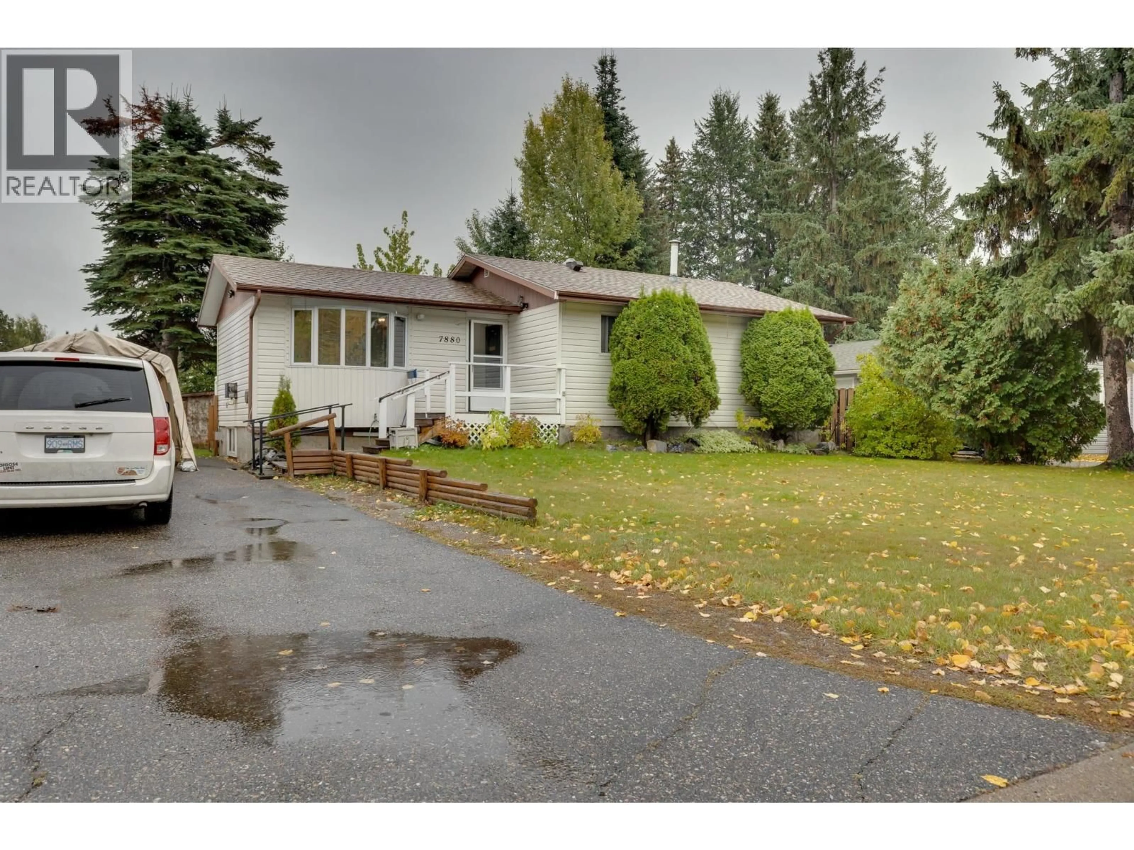 Home with vinyl exterior material, street for 7880 QUEENS CRESCENT, Prince George British Columbia V2N3H6