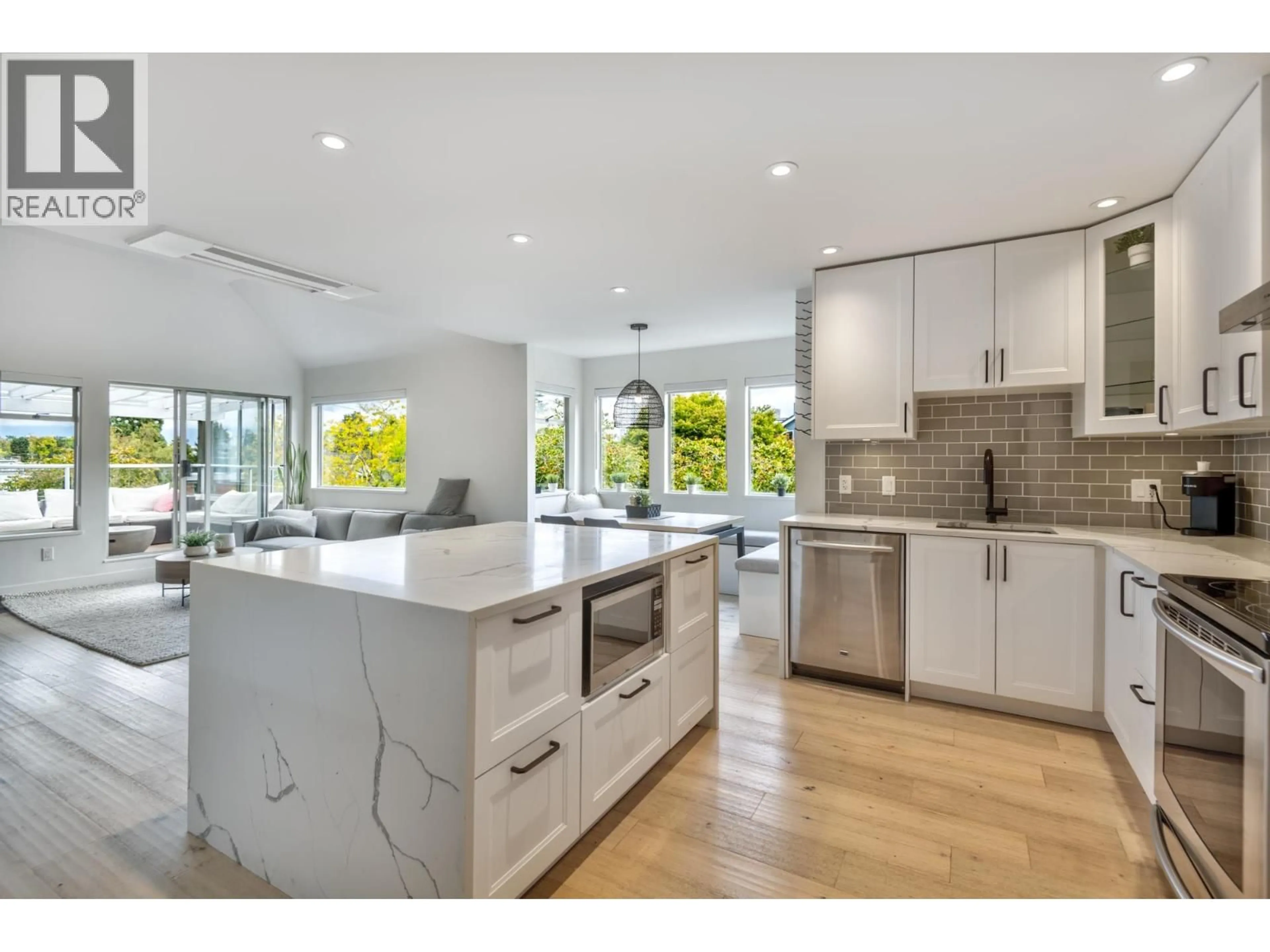 Open concept kitchen, ceramic/tile floor for 304 - 1665 ARBUTUS STREET, Vancouver British Columbia V6J3X3