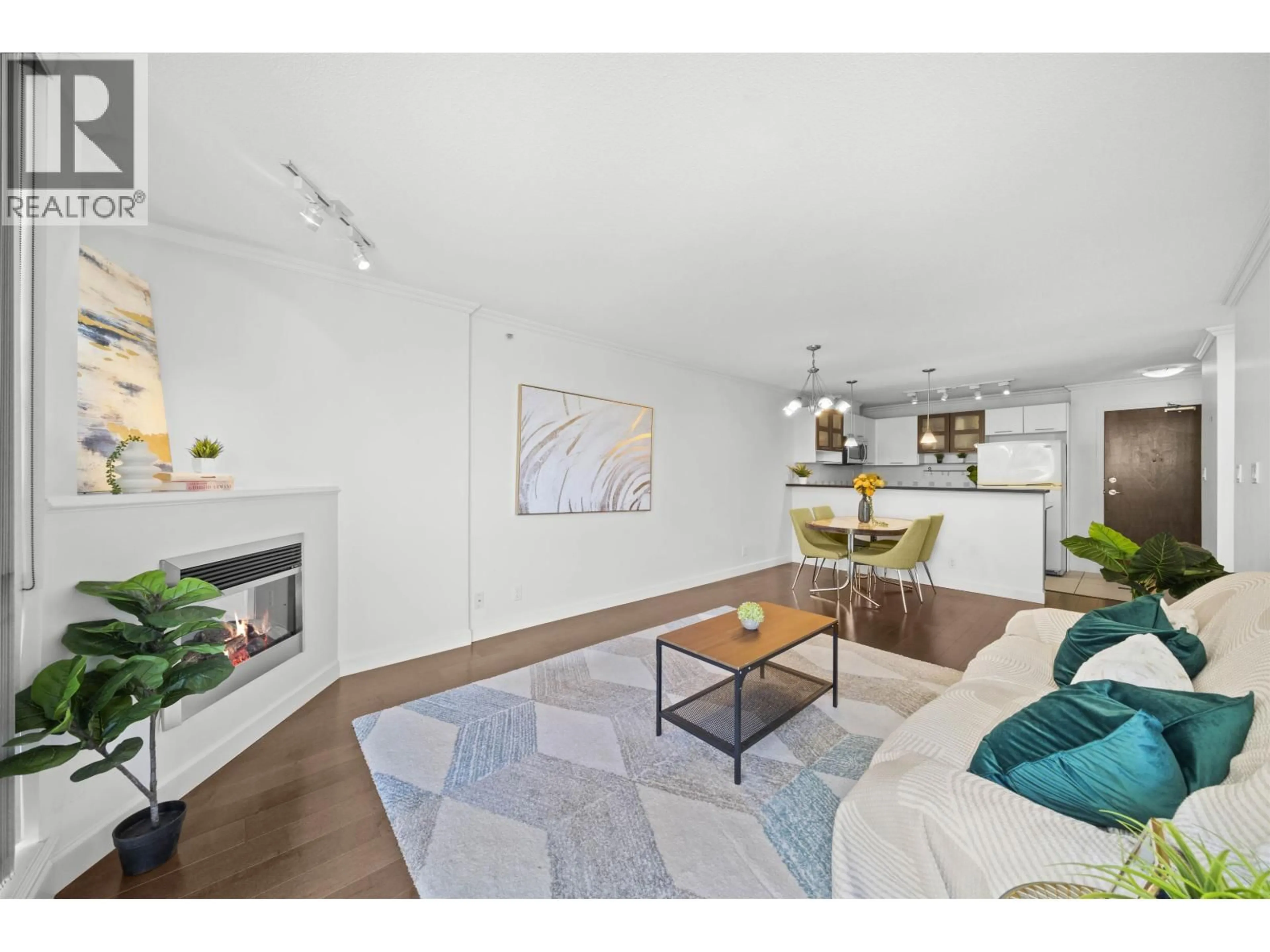 Living room with furniture, wood/laminate floor for 724 - 7831 WESTMINSTER HIGHWAY, Richmond British Columbia V6X4J4