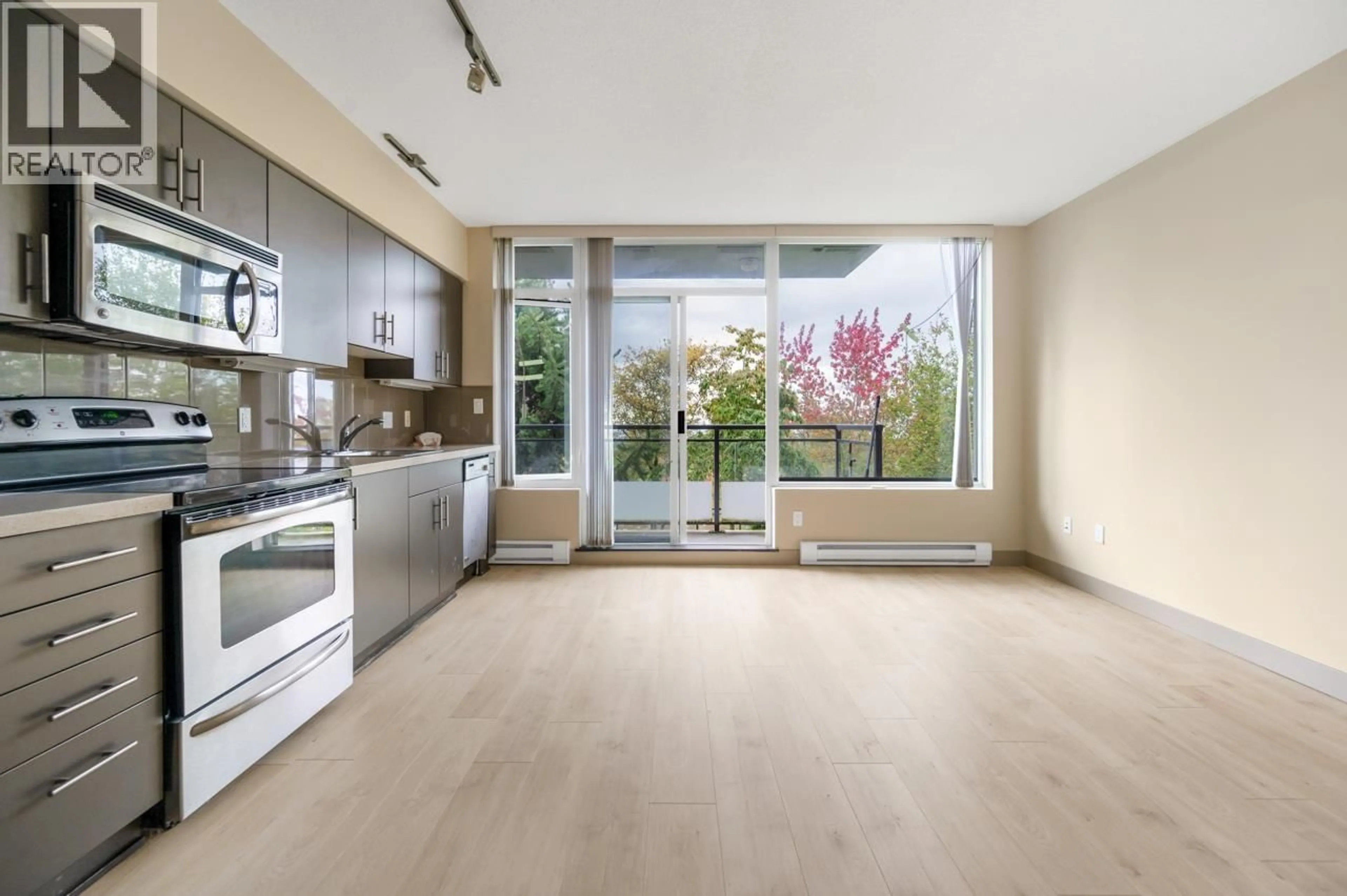 Open concept kitchen, unknown for 501 - 9009 CORNERSTONE MEWS, Burnaby British Columbia V5A0B9