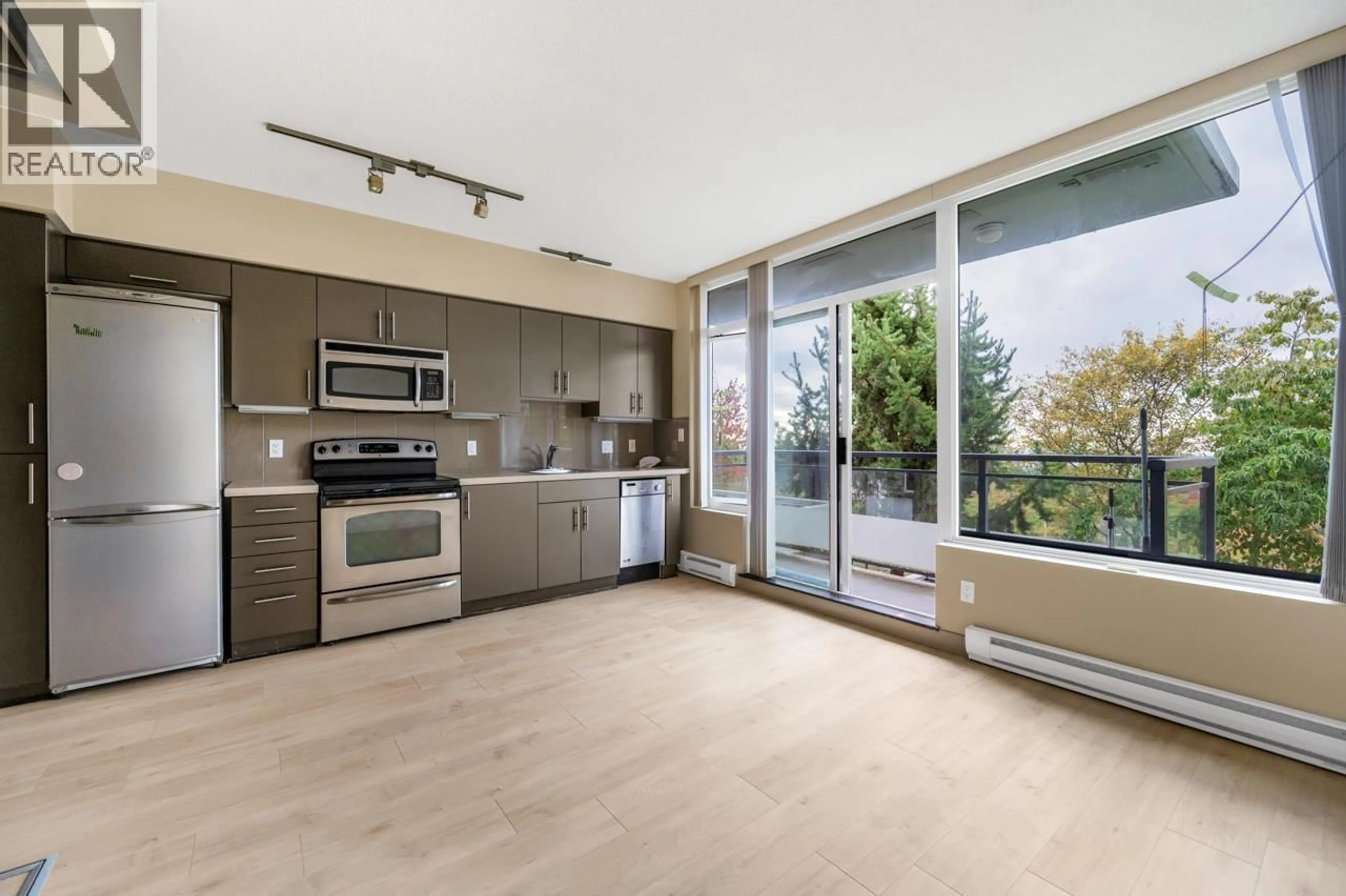 Open concept kitchen, unknown for 501 - 9009 CORNERSTONE MEWS, Burnaby British Columbia V5A0B9