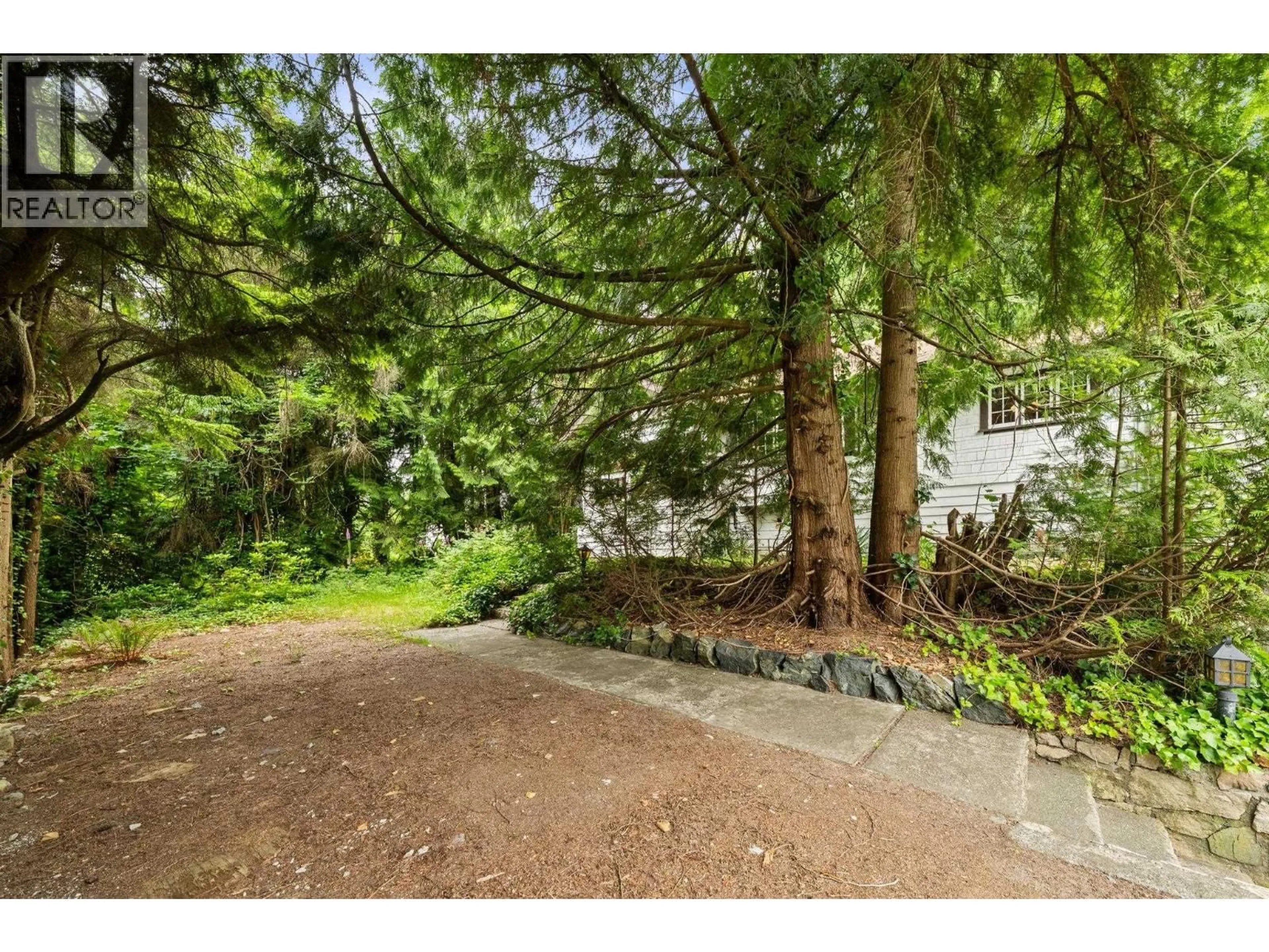 A pic from outside/outdoor area/front of a property/back of a property/a pic from drone, forest/trees view for 338 OSBORNE ROAD, North Vancouver British Columbia V7N1M3