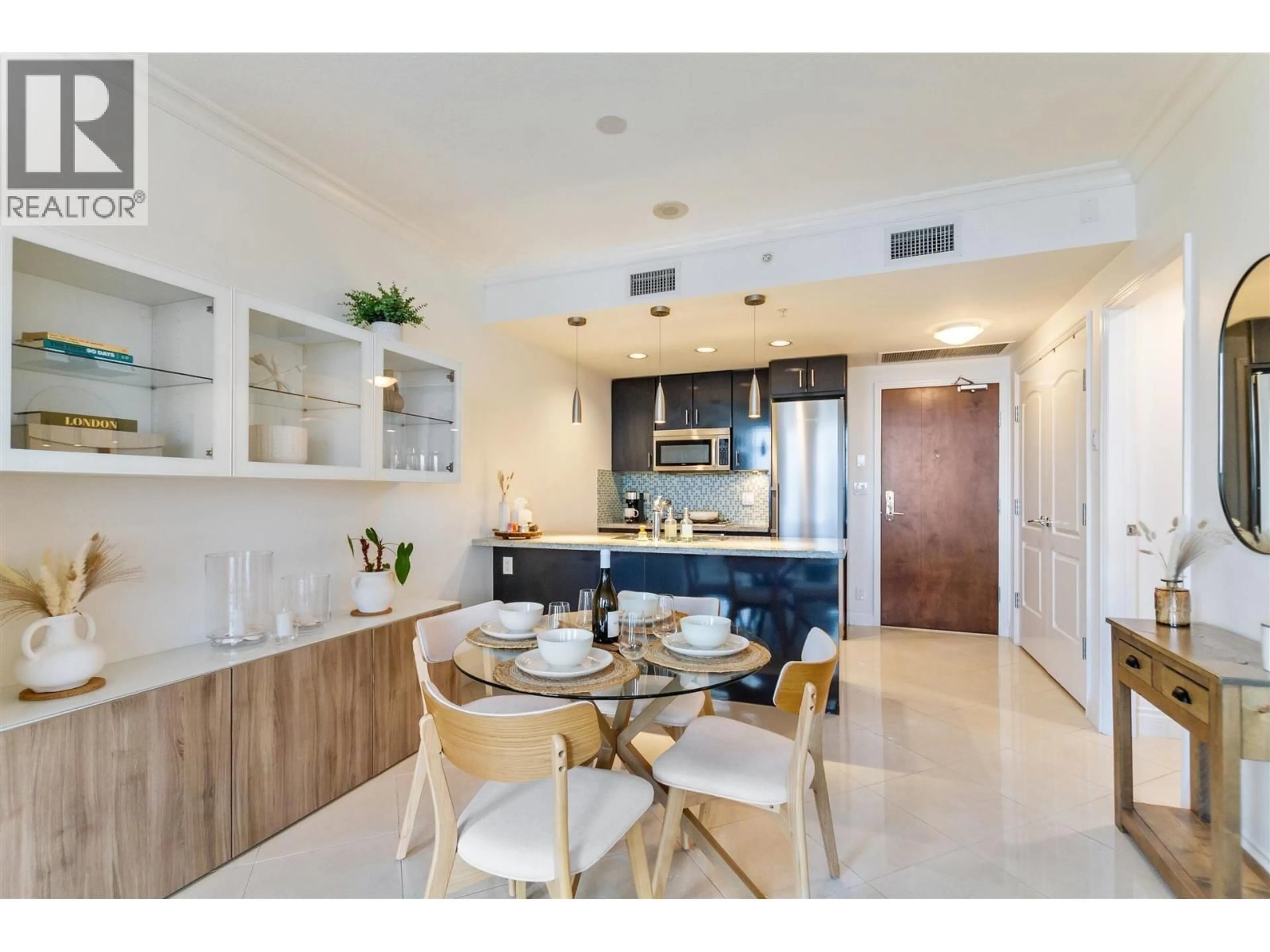 Open concept kitchen, ceramic/tile floor for 603 - 172 VICTORY SHIP WAY, North Vancouver British Columbia V7L0B5