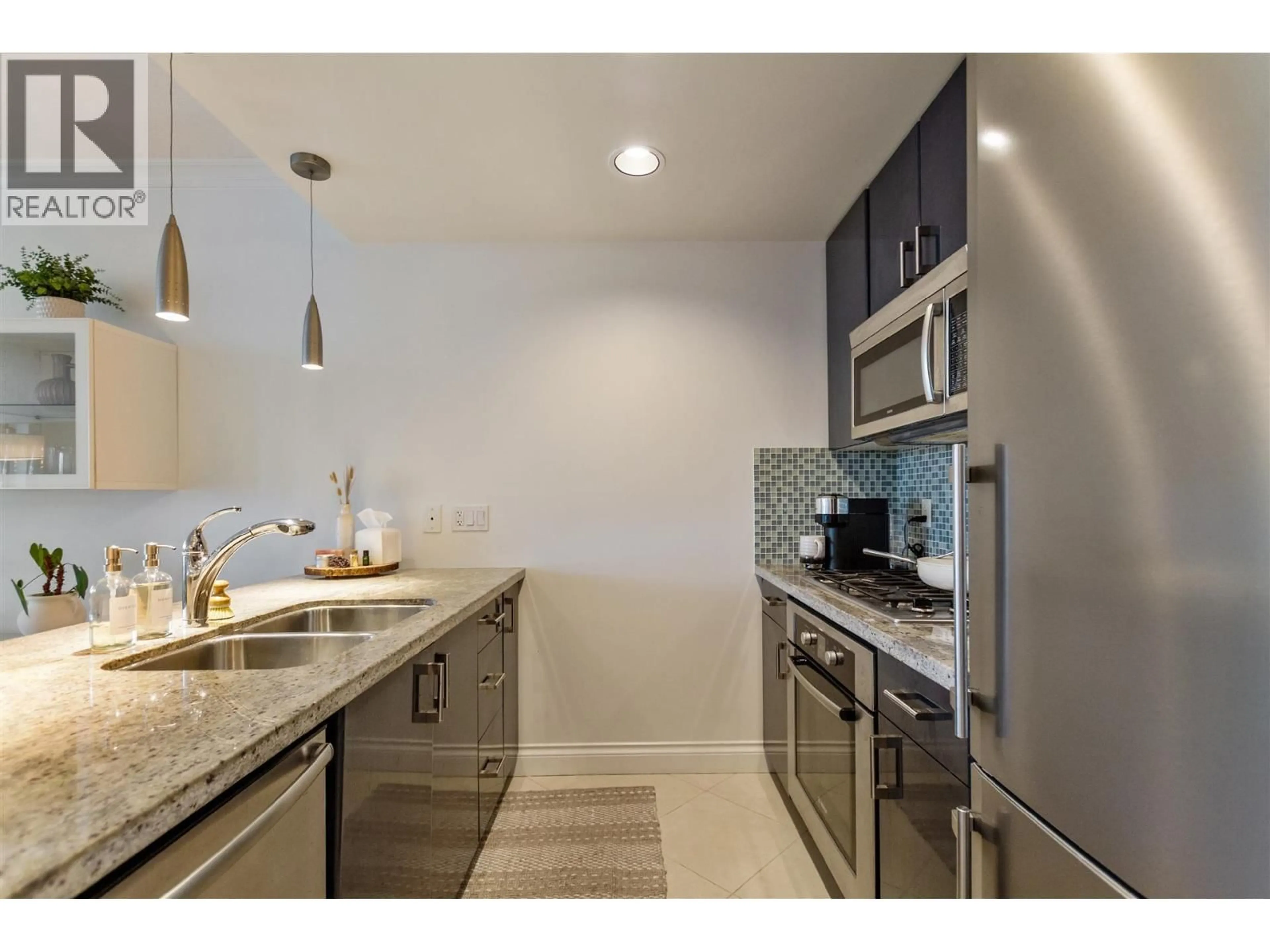 Standard kitchen, ceramic/tile floor for 603 - 172 VICTORY SHIP WAY, North Vancouver British Columbia V7L0B5