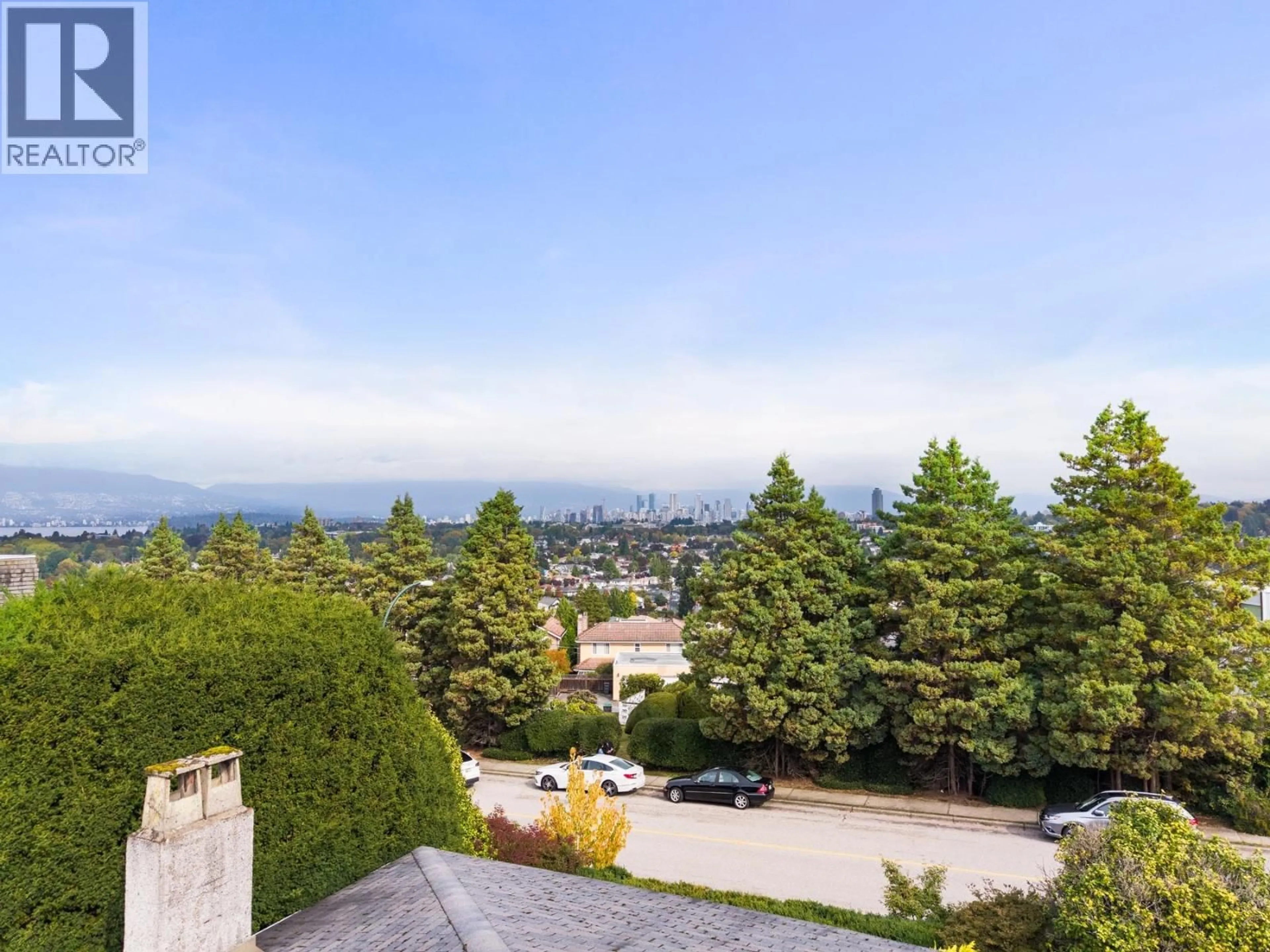 A pic from outside/outdoor area/front of a property/back of a property/a pic from drone, mountain view for 4275 QUESNEL DRIVE, Vancouver British Columbia V6L2X5