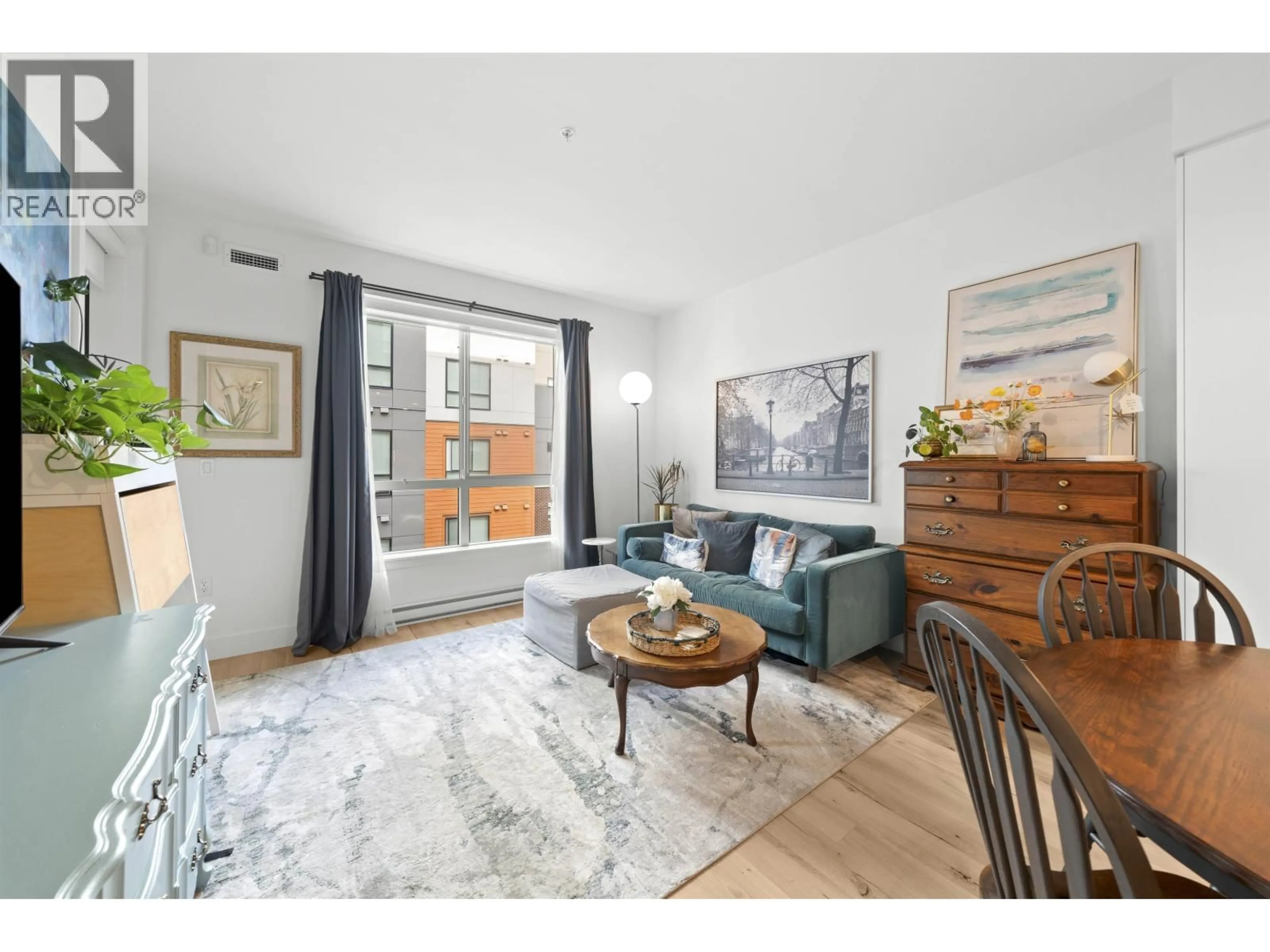 Living room with furniture, wood/laminate floor for 422 - 3131 MURRAY STREET, Port Moody British Columbia V3H0L9