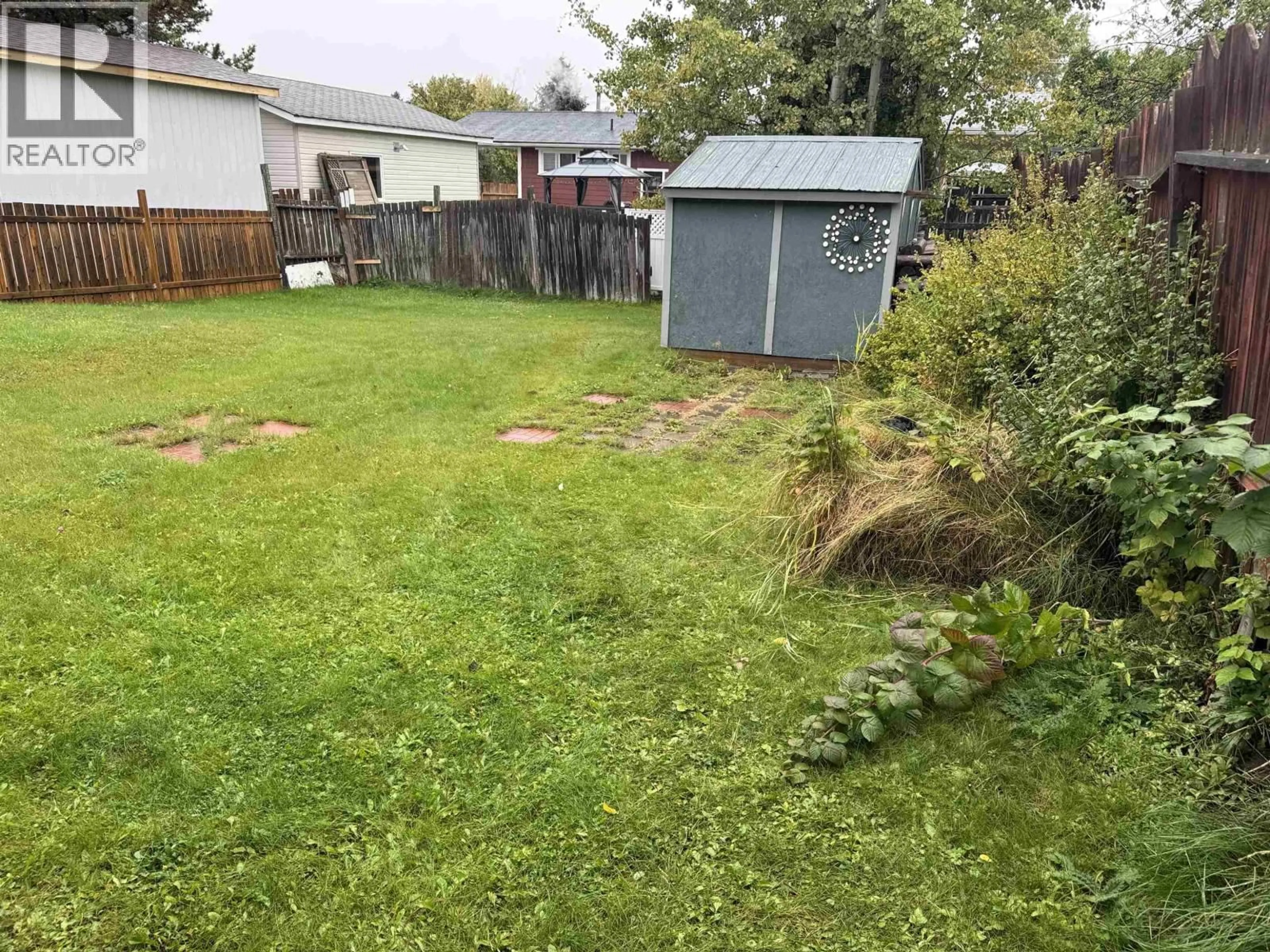 A pic from outside/outdoor area/front of a property/back of a property/a pic from drone, street for 232 BLACKWATER CRESCENT, Mackenzie British Columbia V0J2C0