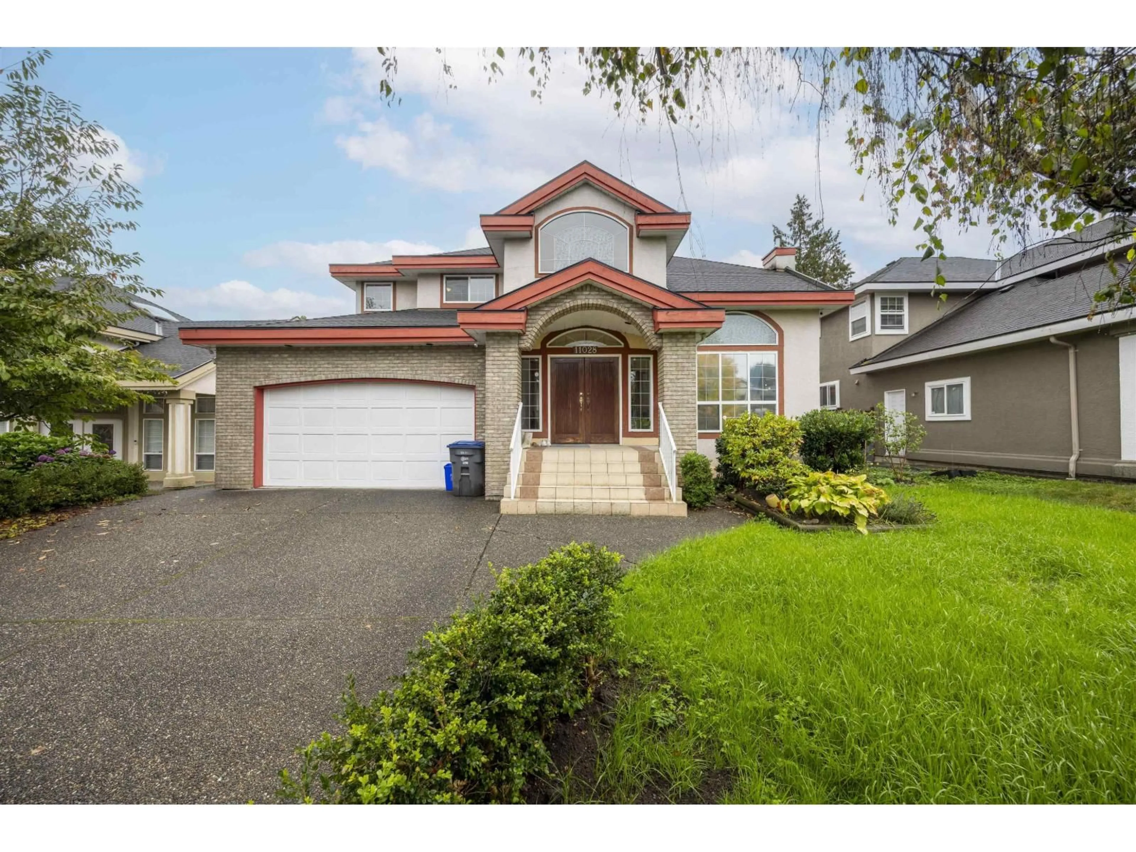 Home with vinyl exterior material, street for 11028 162A, Surrey British Columbia V4N4S8
