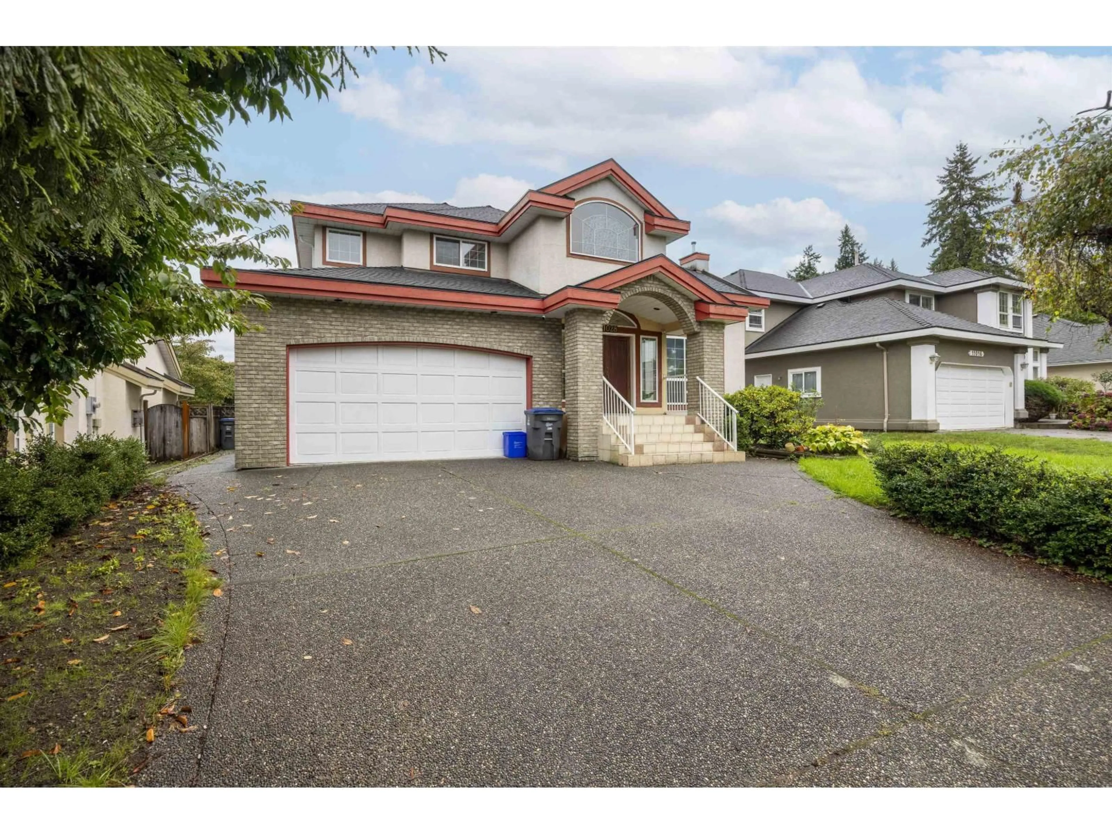 Home with vinyl exterior material, street for 11028 162A, Surrey British Columbia V4N4S8