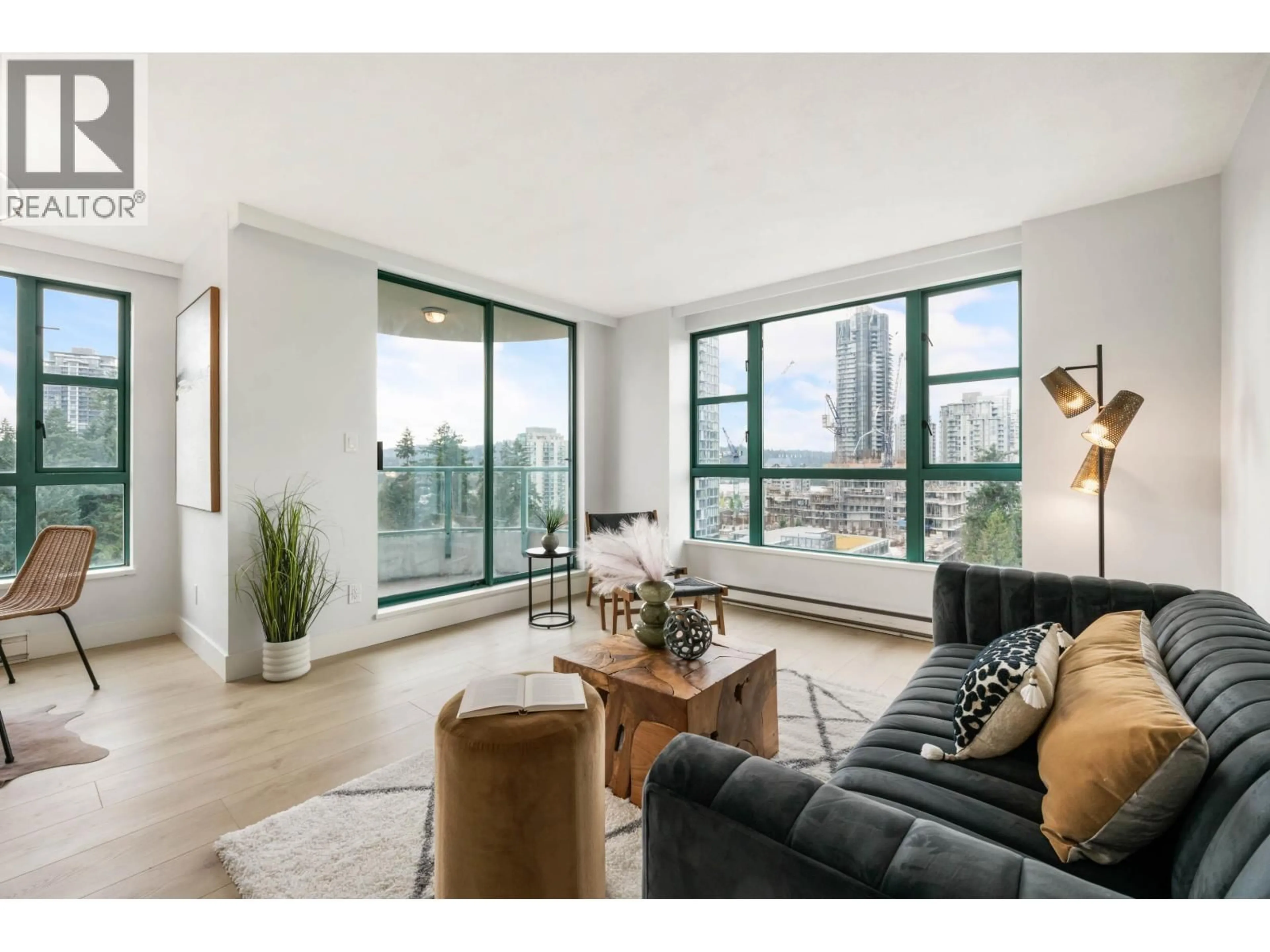 Living room with furniture, wood/laminate floor for 1303 - 3071 GLEN DRIVE, Coquitlam British Columbia V3B7R1