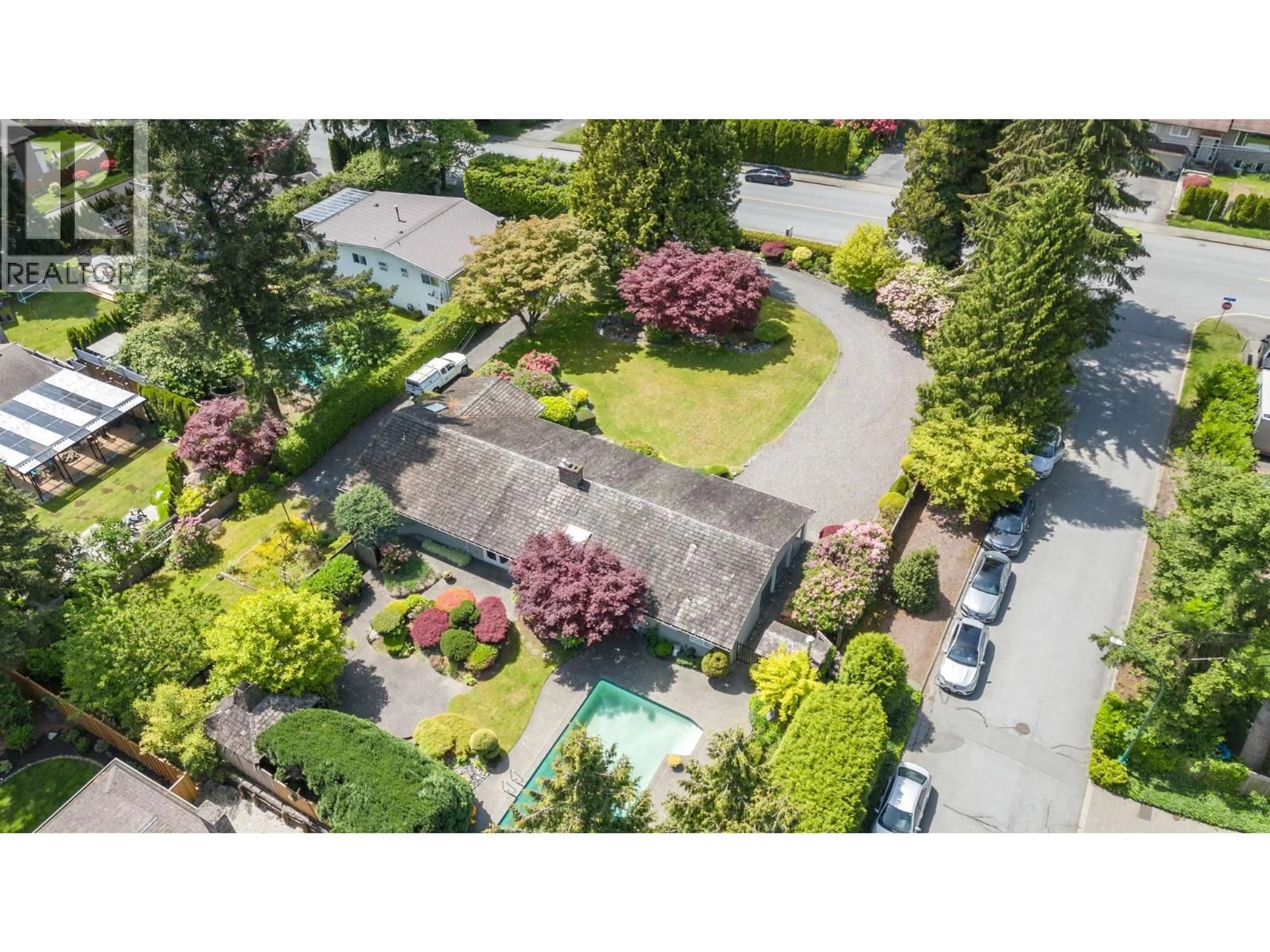 A pic from outside/outdoor area/front of a property/back of a property/a pic from drone, street for 1488 BERKLEY ROAD, North Vancouver British Columbia V7H1Y7