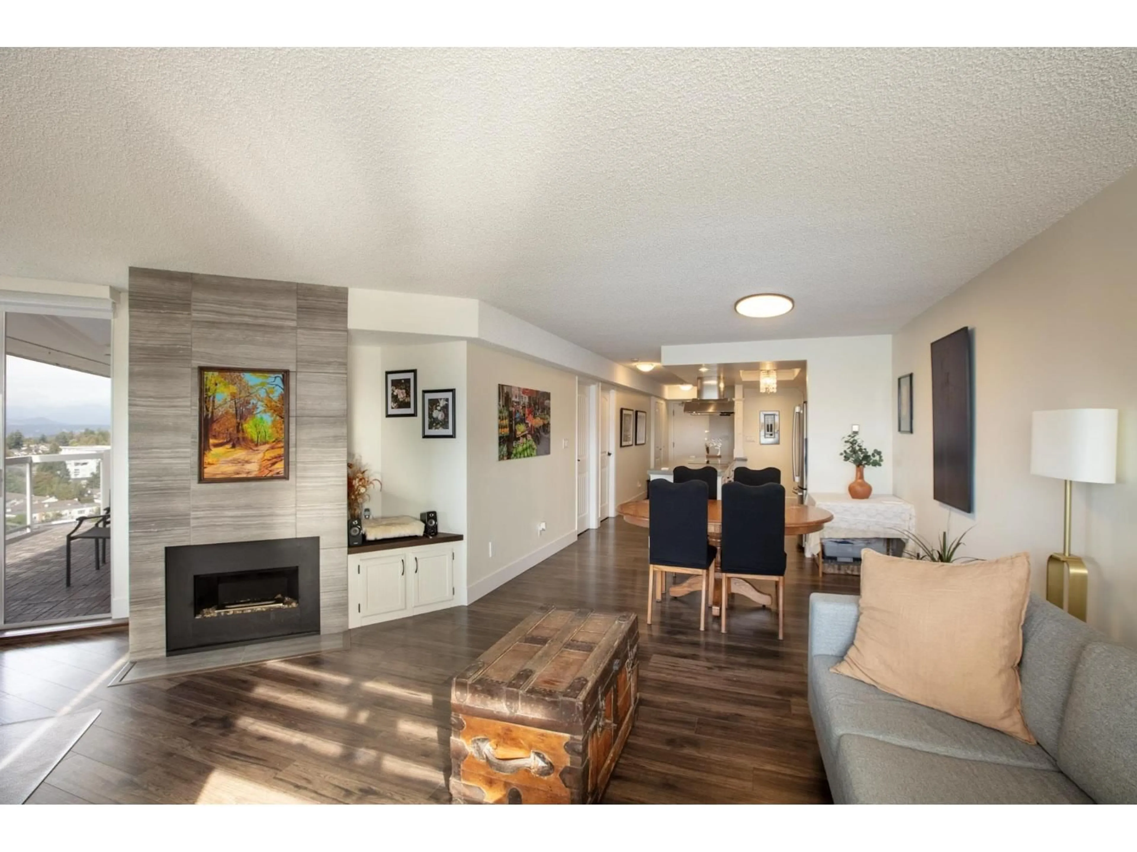 Living room with furniture, wood/laminate floor for 1505 - 11881 88, Delta British Columbia V4C8A2