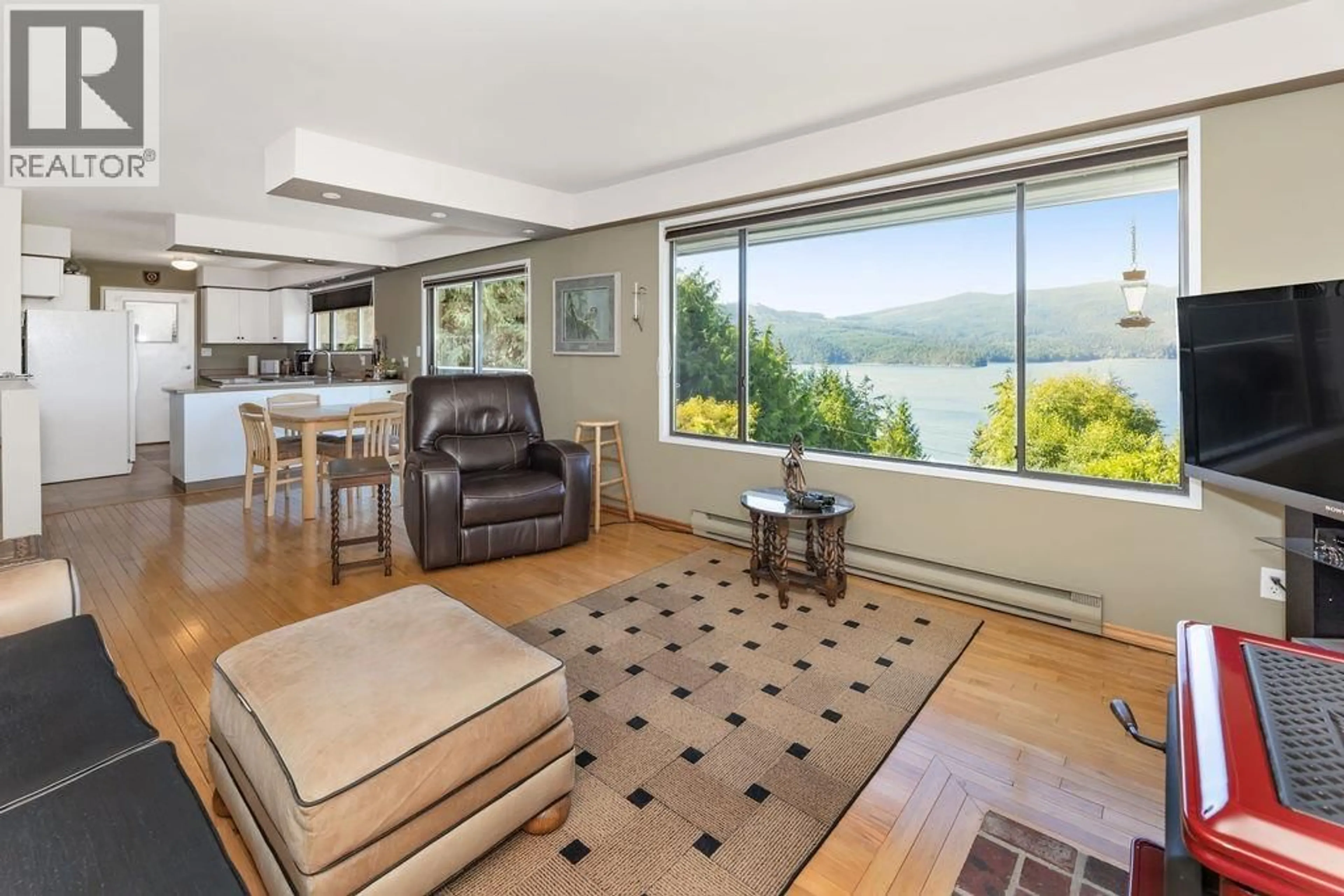 Living room with furniture, unknown for 6950 PORPOISE DRIVE, Sechelt British Columbia V7Z0C8