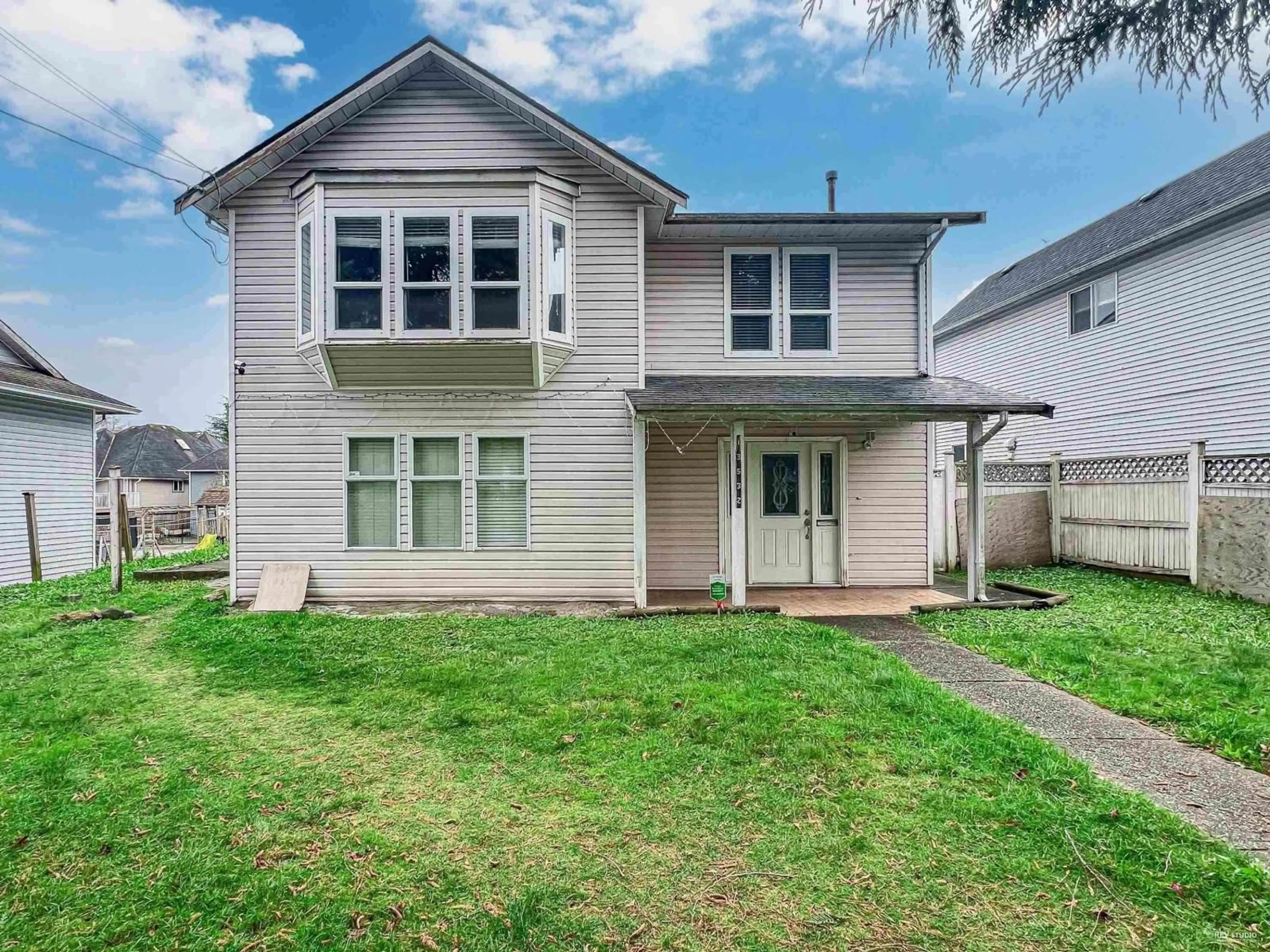 Home with vinyl exterior material, street for 13532 64, Surrey British Columbia V3W1Y3