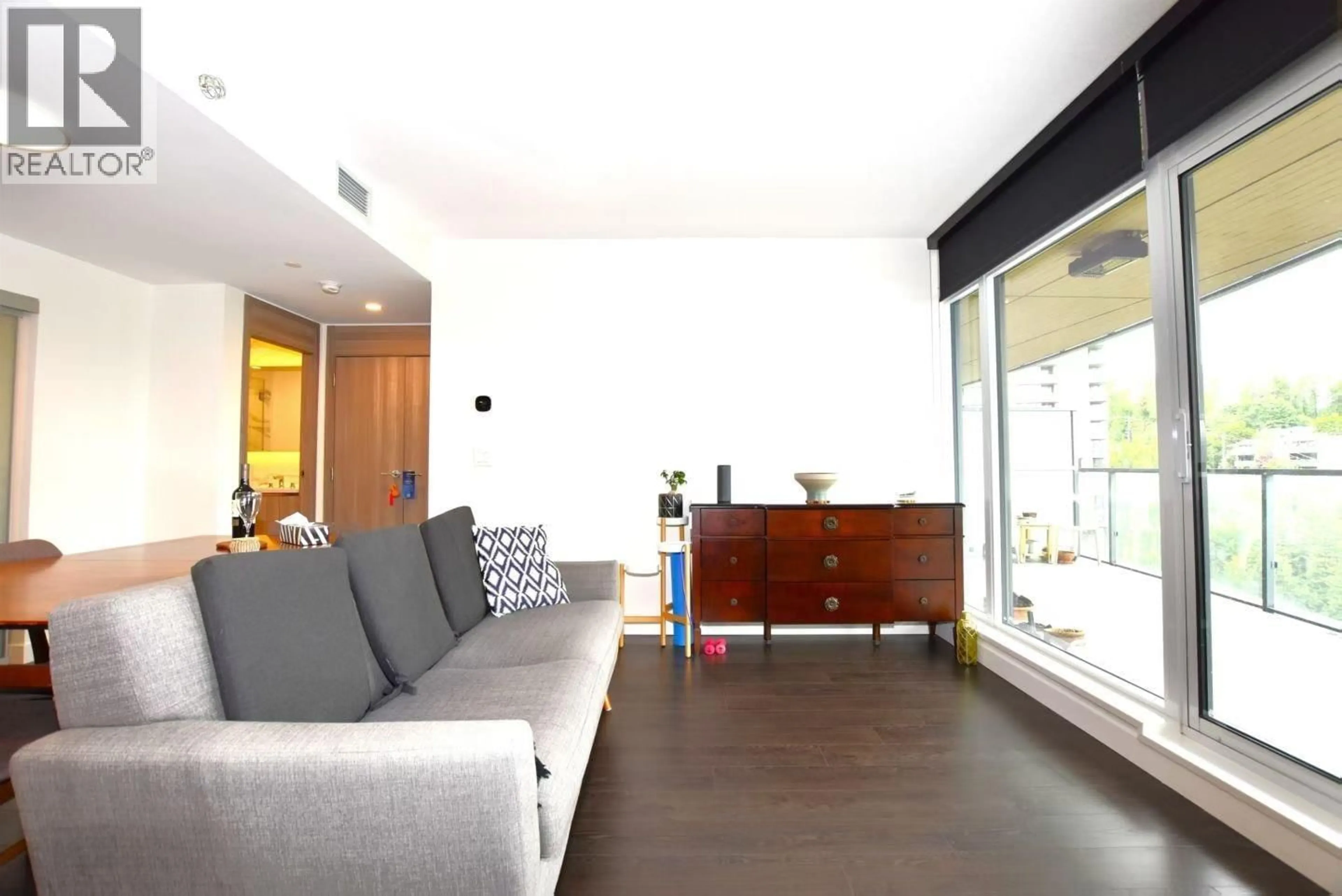 Living room with furniture, unknown for 608 - 4890 LOUGHEED HIGHWAY, Burnaby British Columbia V5C0N2
