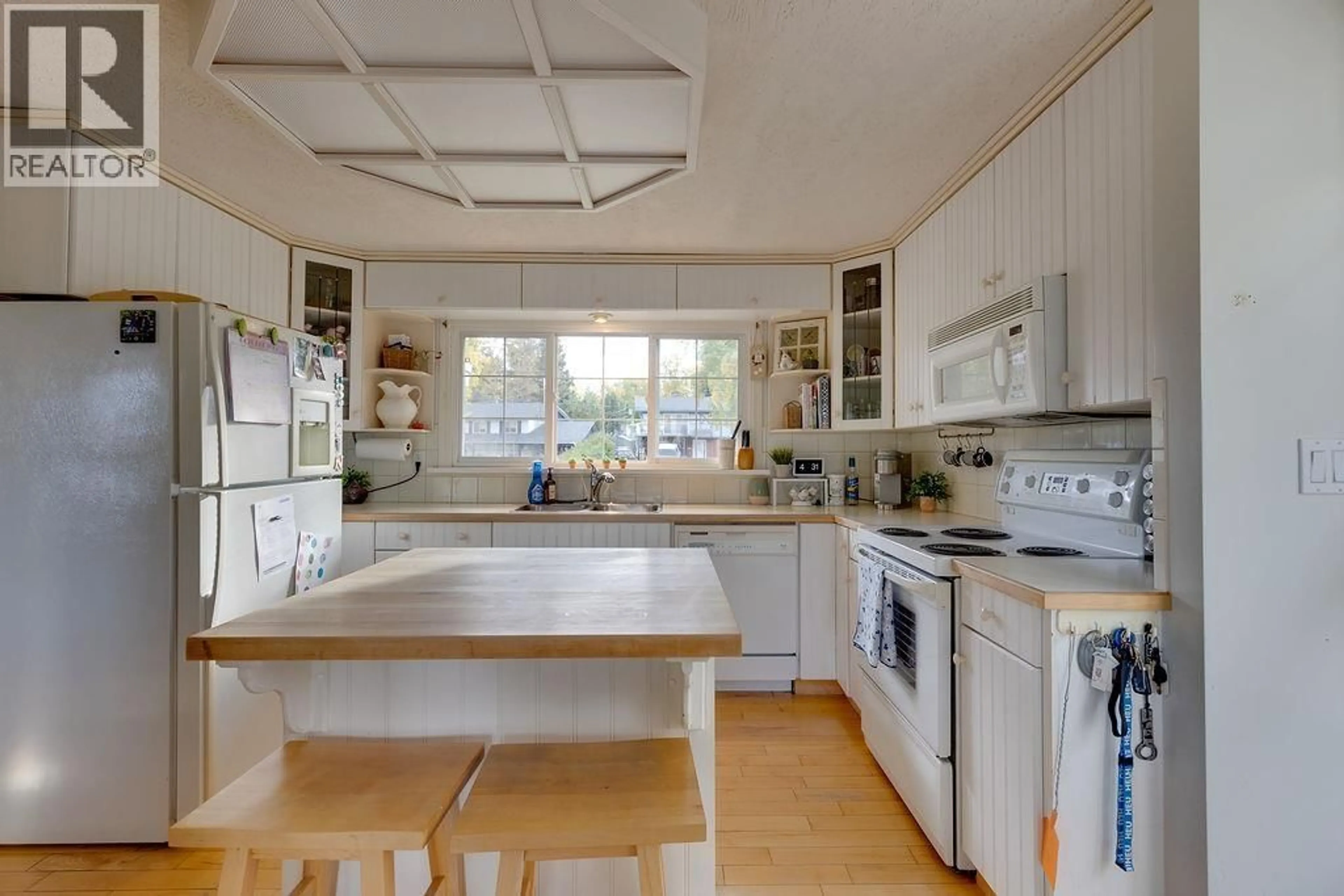 Open concept kitchen, ceramic/tile floor for 2642 CAPELLA DRIVE, Prince George British Columbia V2N5L5