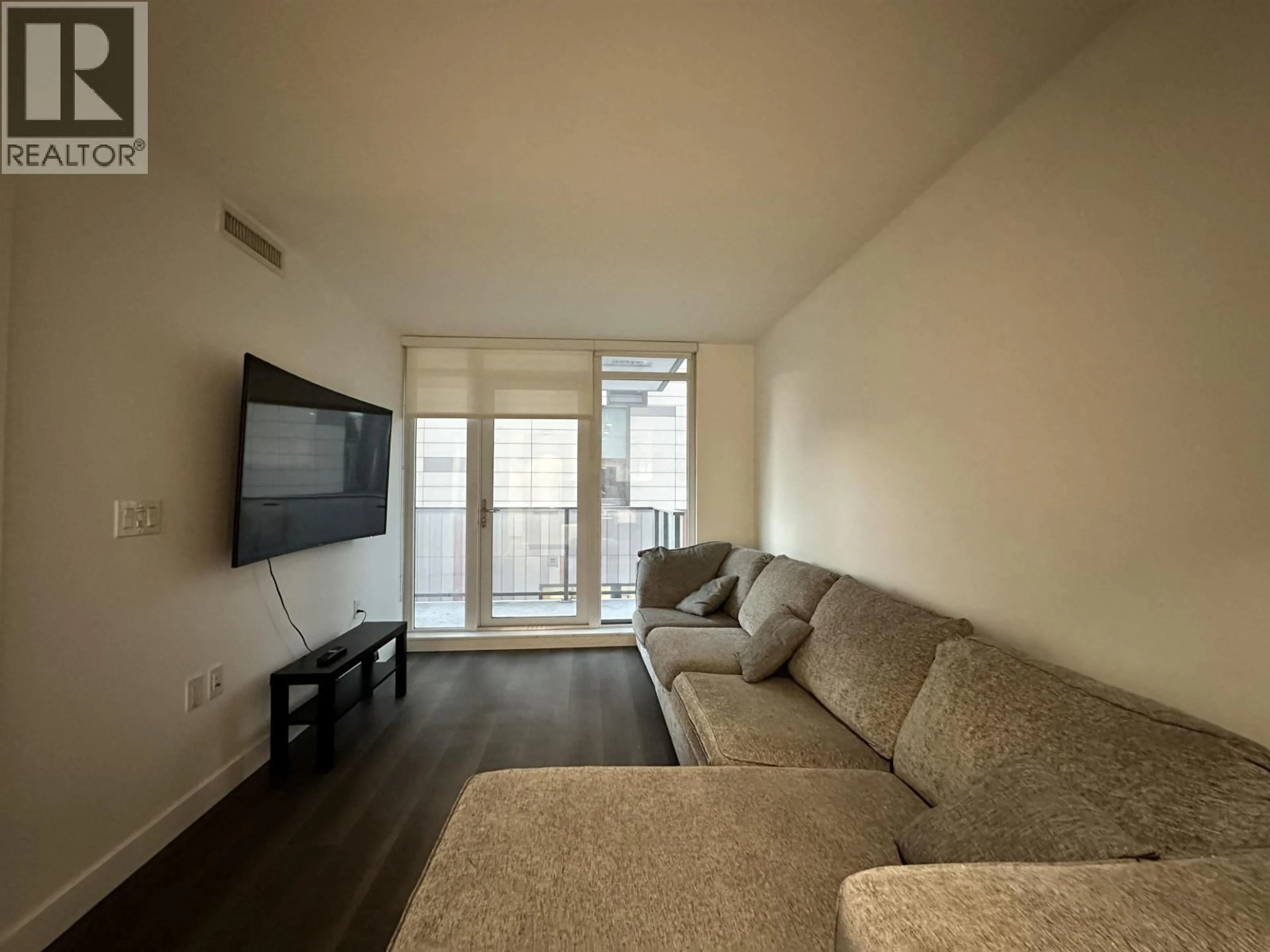 Living room with furniture, unknown for 202 - 8181 CHESTER STREET, Vancouver British Columbia V5X0J9