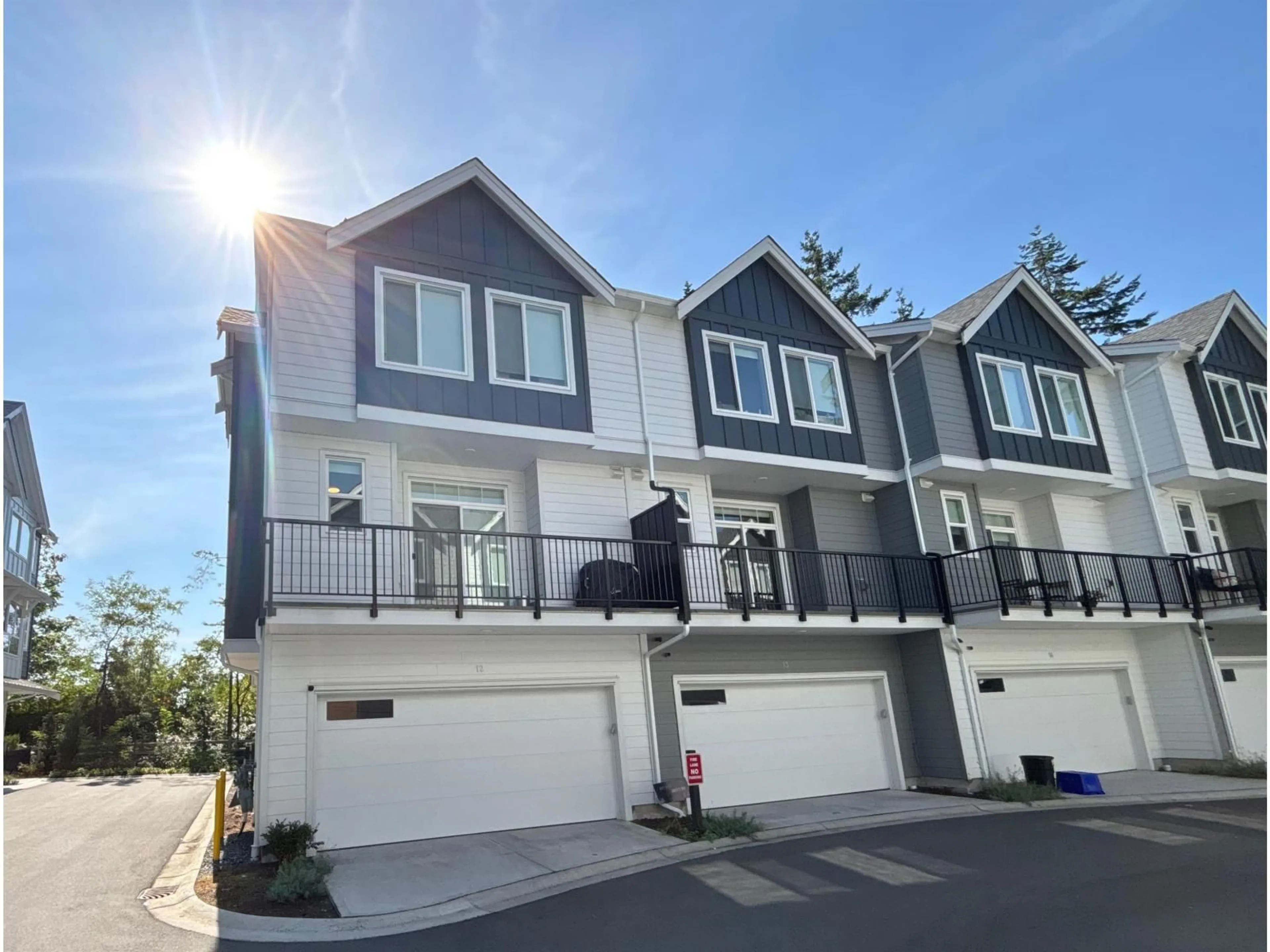A pic from outside/outdoor area/front of a property/back of a property/a pic from drone, street for 12 - 17458 100, Surrey British Columbia V4N6X1