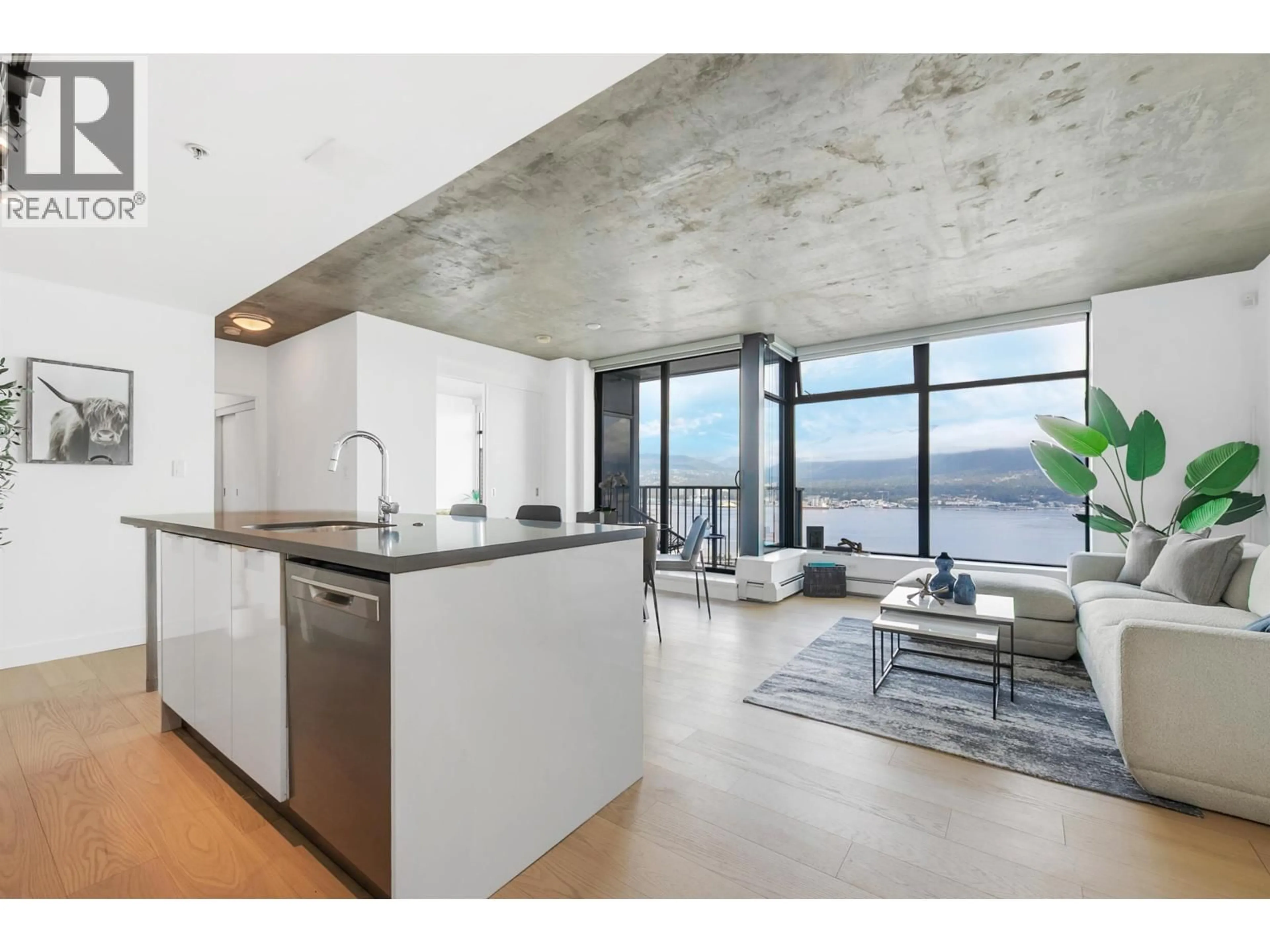 Open concept kitchen, cement floor for 3901 - 128 CORDOVA STREET, Vancouver British Columbia V6B0E6