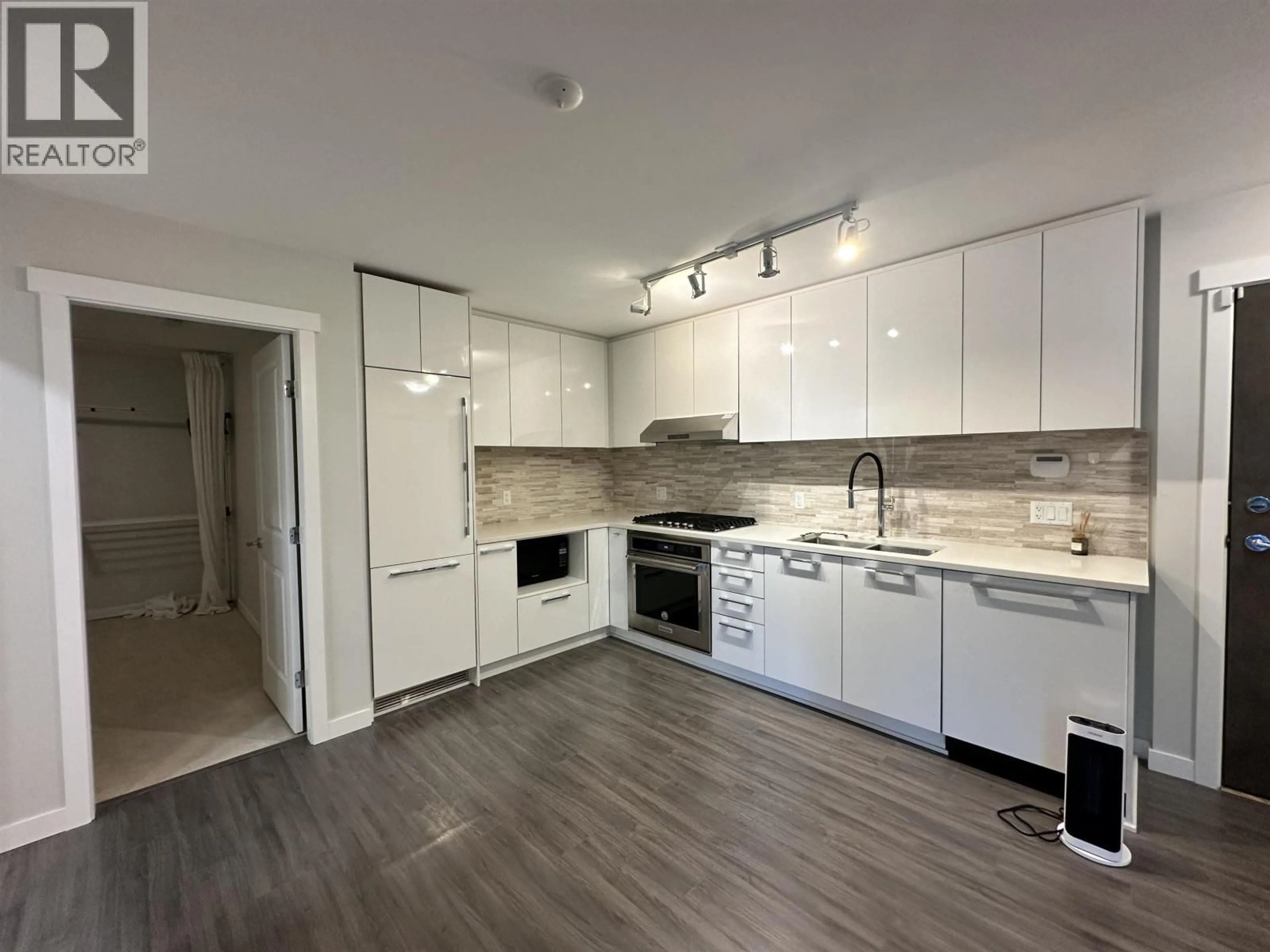 Open concept kitchen, unknown for 122 - 9500 TOMICKI AVENUE, Vancouver British Columbia V6X0R9