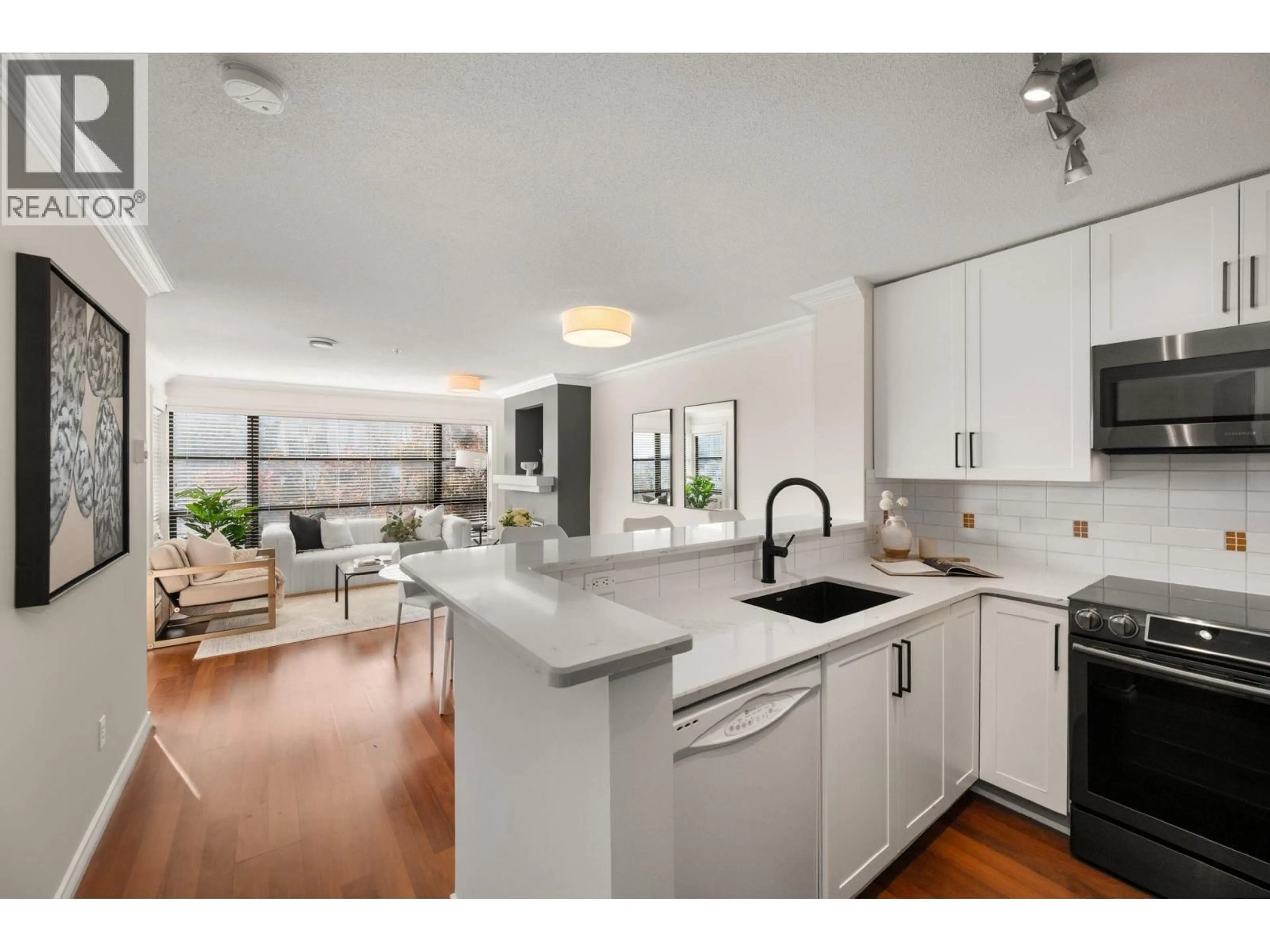 Open concept kitchen, unknown for 301 - 124 3RD STREET, North Vancouver British Columbia V7M1E8