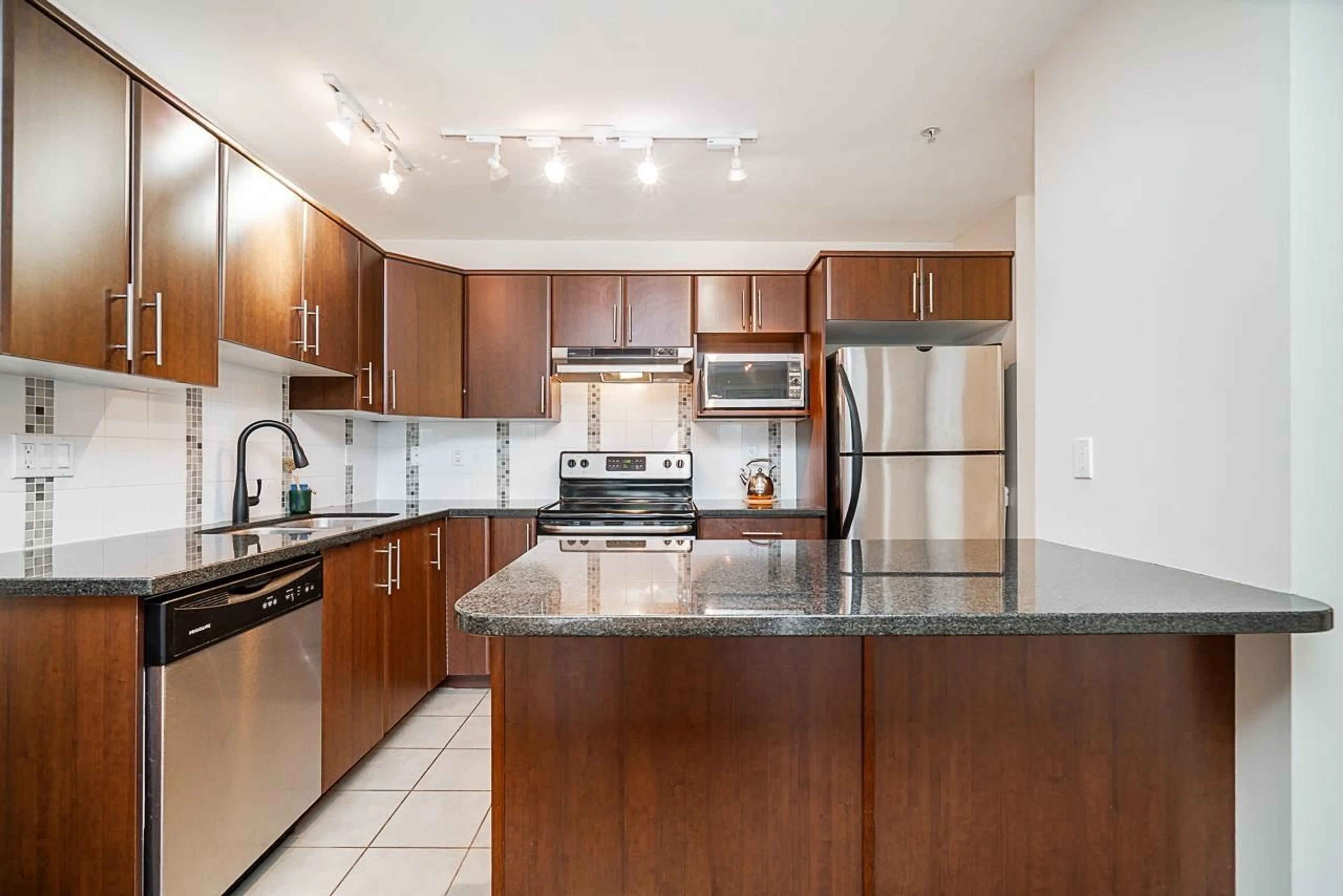 Standard kitchen, ceramic/tile floor for 309 - 19388 65, Surrey British Columbia V4N5S1